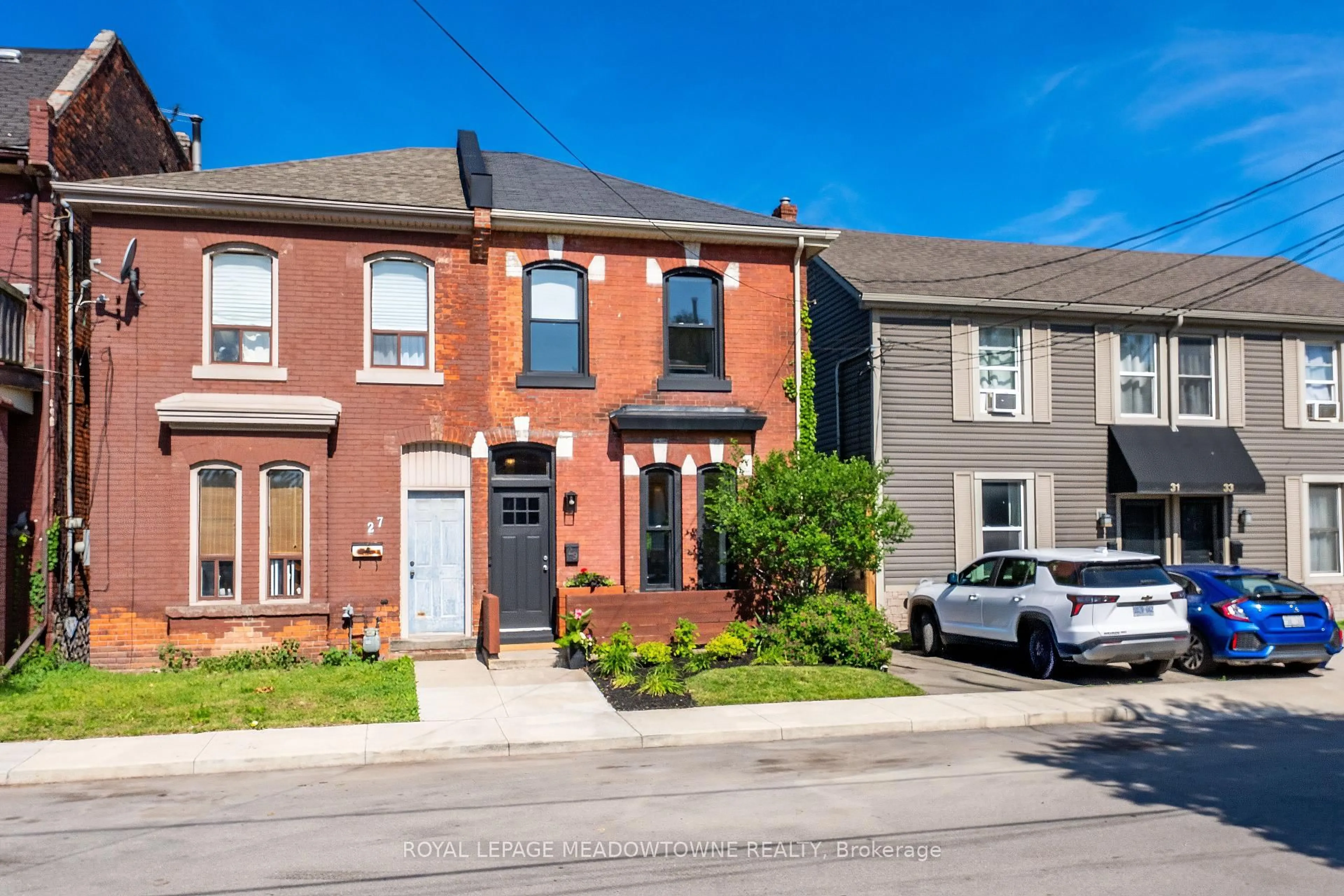 Home with brick exterior material, street for 29 Railway St, Hamilton Ontario L8R 2R4