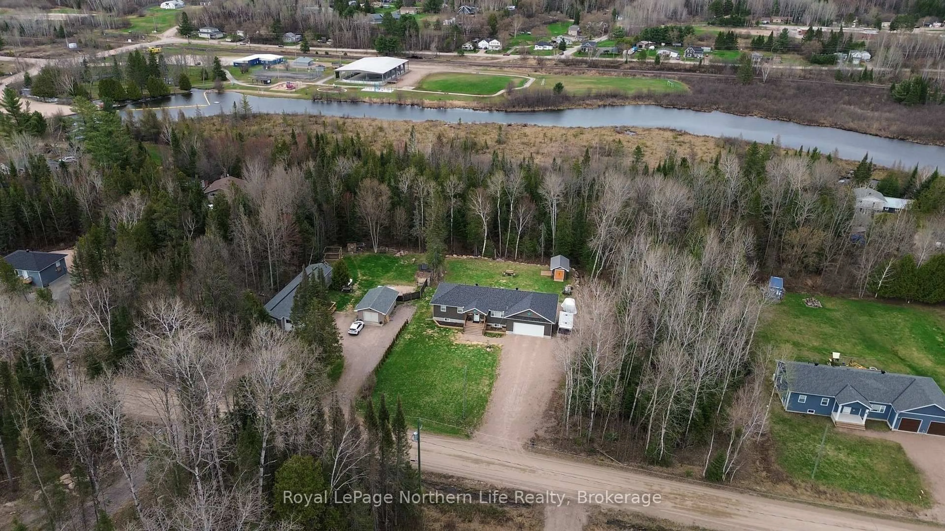 A pic from outside/outdoor area/front of a property/back of a property/a pic from drone, water/lake/river/ocean view for 106 Riverside Dr, Bonfield Ontario P0H 1E0