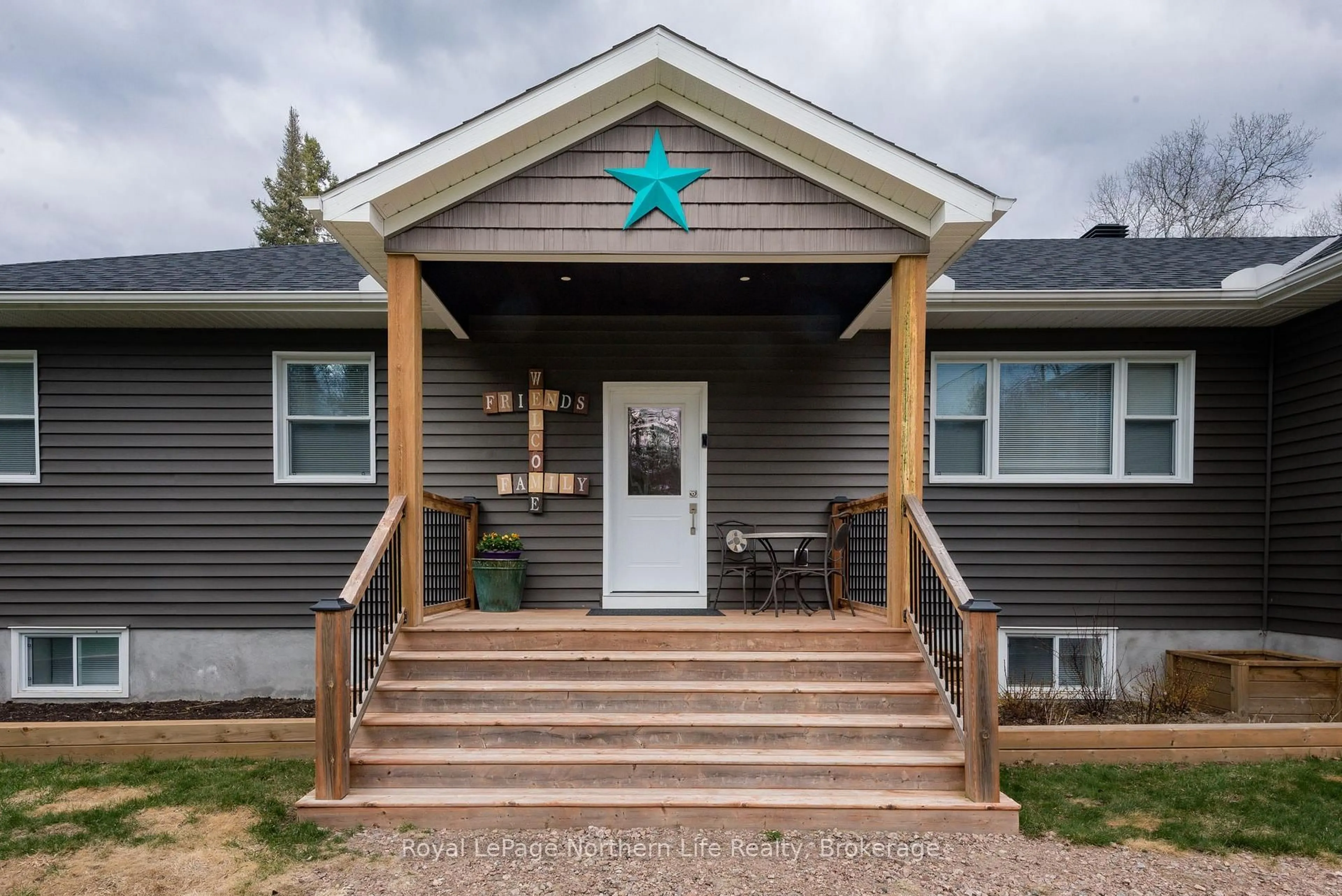 Home with vinyl exterior material, street for 106 Riverside Dr, Bonfield Ontario P0H 1E0