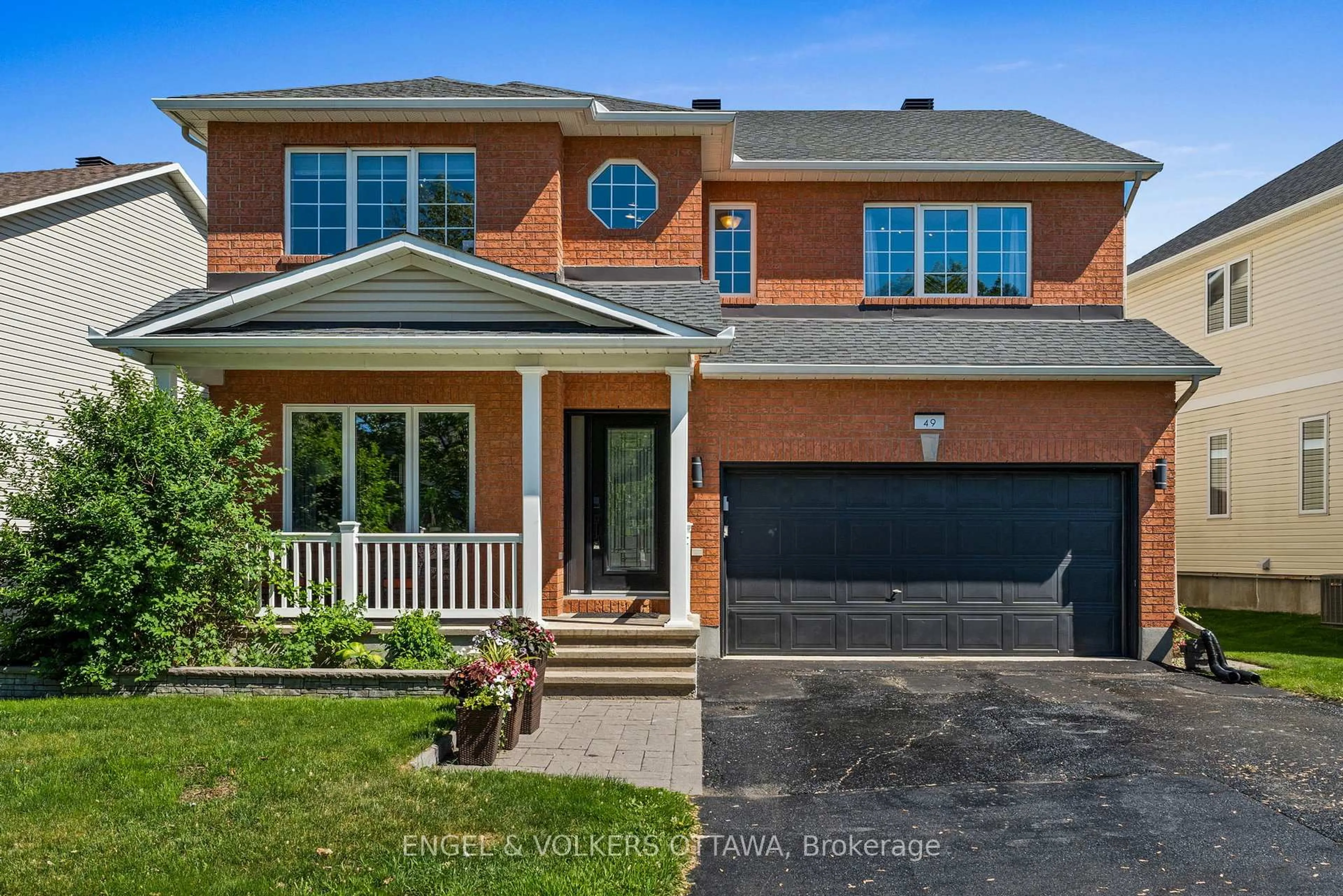Home with brick exterior material, street for 49 Kittiwake Dr, Stittsville Ontario K2S 1Z8