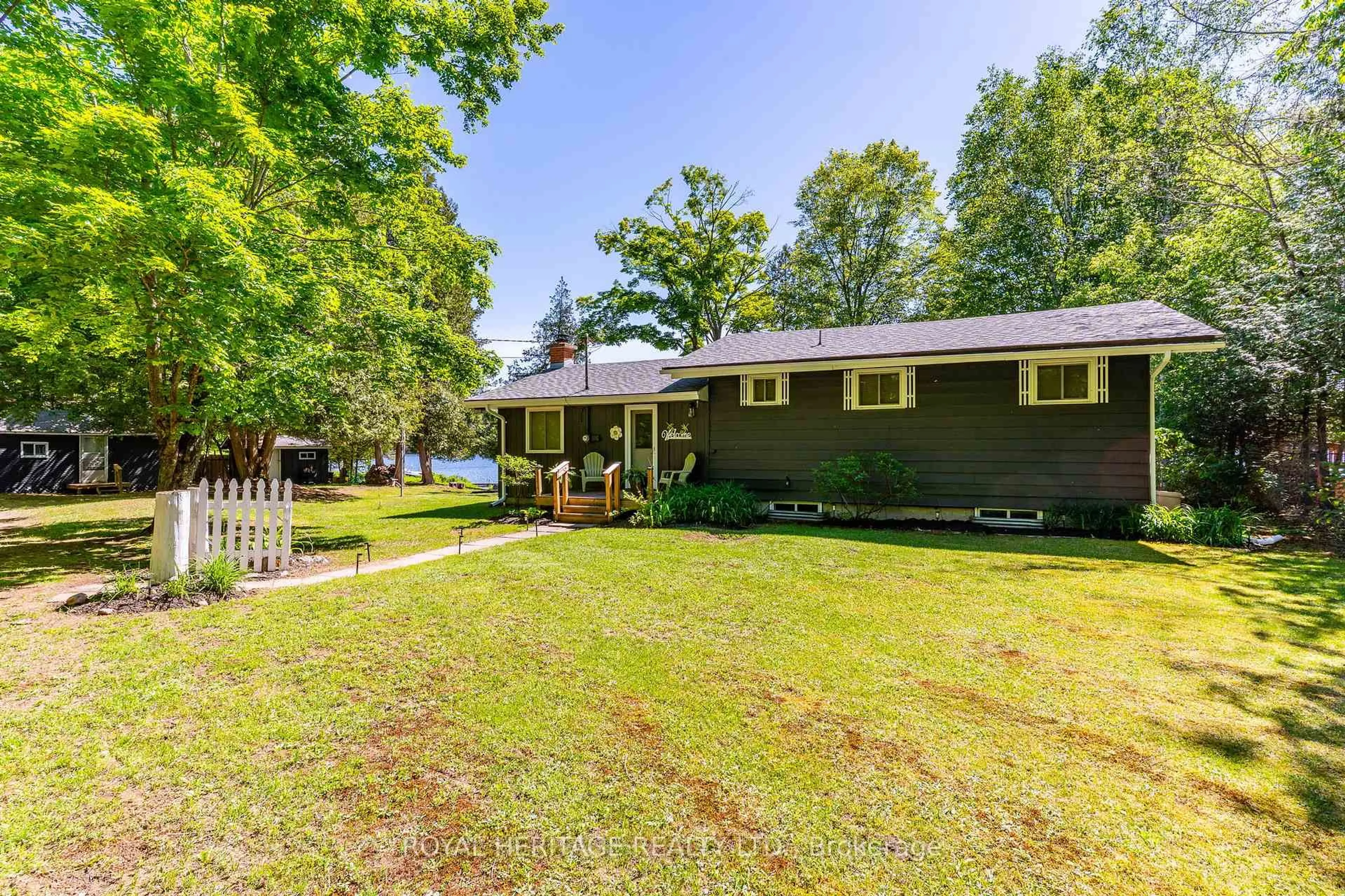 A pic from outside/outdoor area/front of a property/back of a property/a pic from drone, water/lake/river/ocean view for 1582 Hospitality Rd, Minden Hills Ontario K0M 2K0