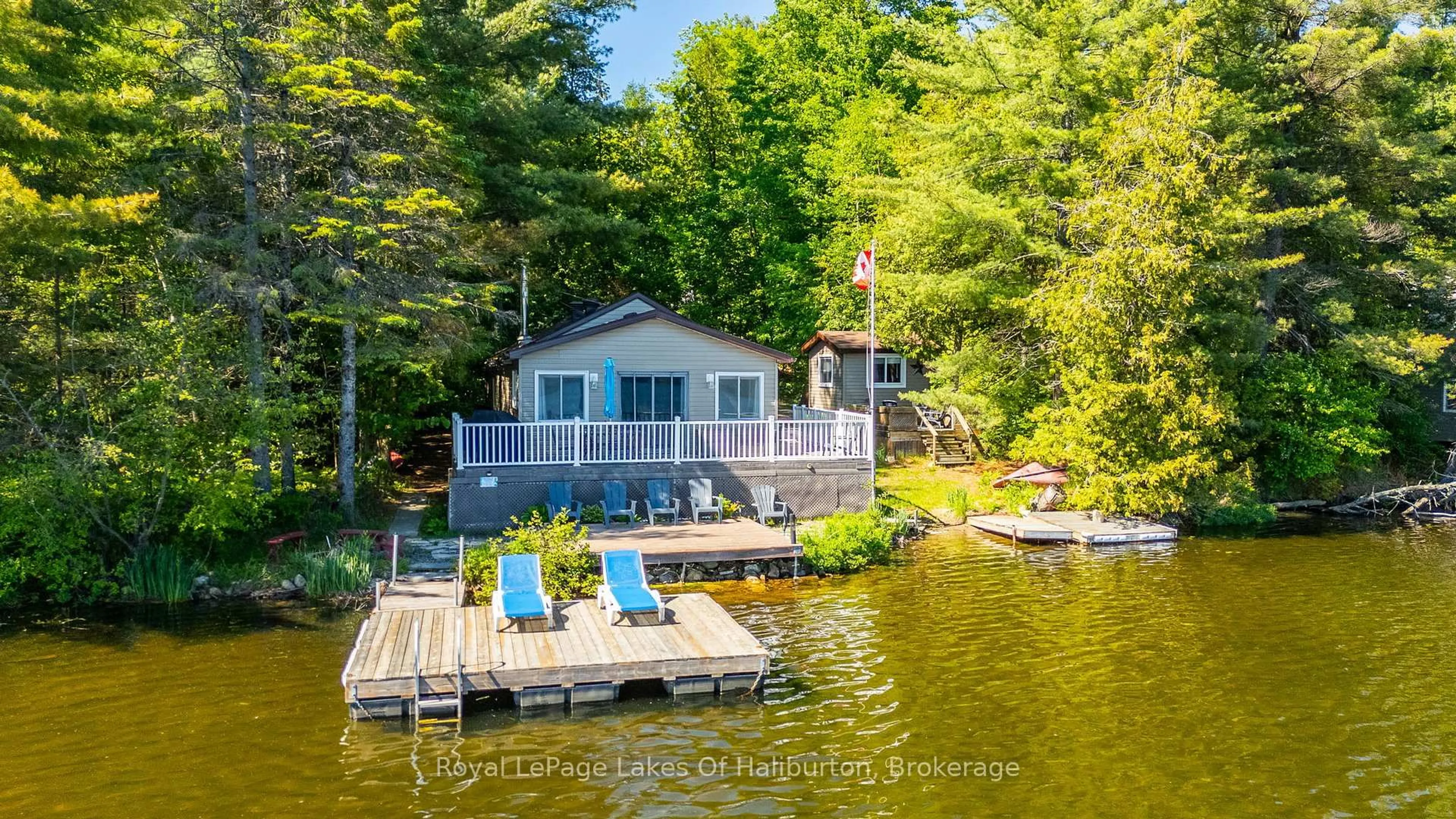 A pic from outside/outdoor area/front of a property/back of a property/a pic from drone, water/lake/river/ocean view for 1010 Pike Lane, Dysart et al Ontario K0M 1S0