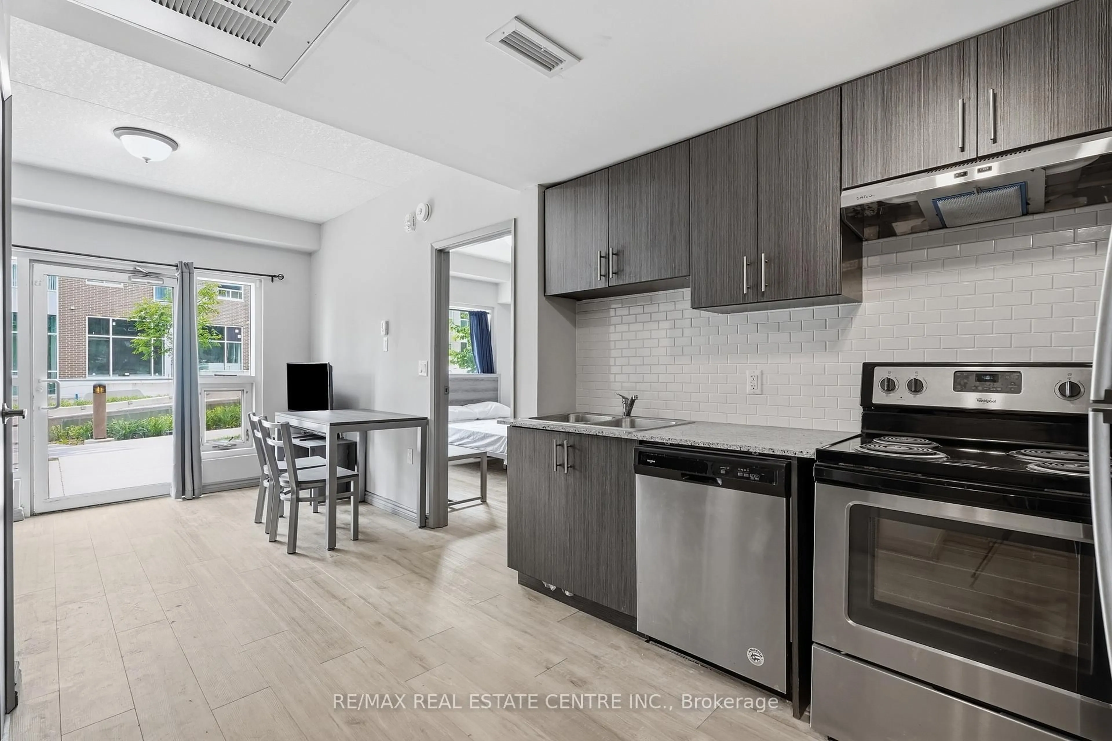 Open concept kitchen, ceramic/tile floor for 275 Larch St #B02, Waterloo Ontario N2L 3R2