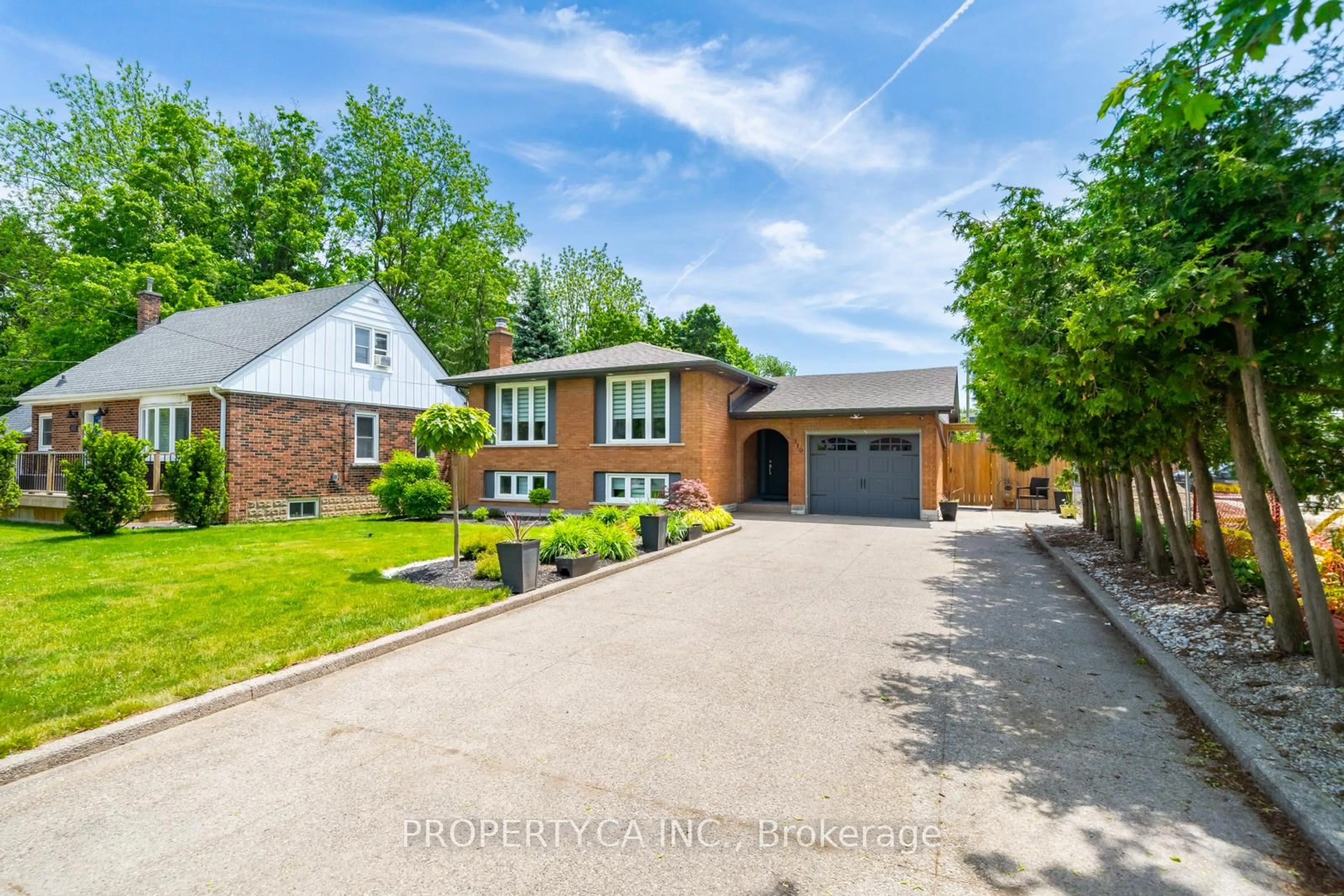 A pic from outside/outdoor area/front of a property/back of a property/a pic from drone, street for 310 Parkside Dr, Hamilton Ontario L0R 2H5