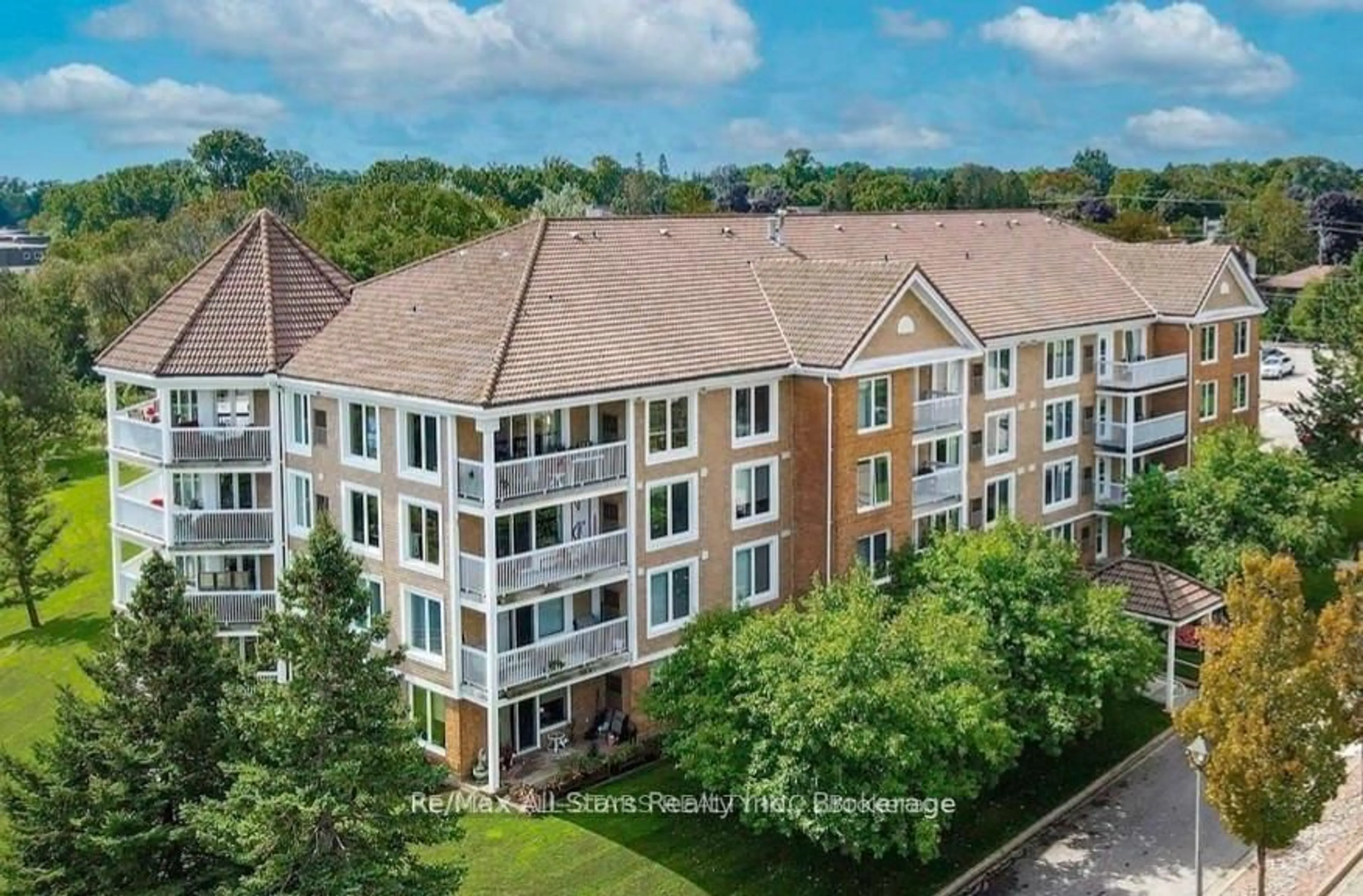 A pic from outside/outdoor area/front of a property/back of a property/a pic from drone, unknown for 50 Rivermill Blvd #408, Kawartha Lakes Ontario K9V 6C1