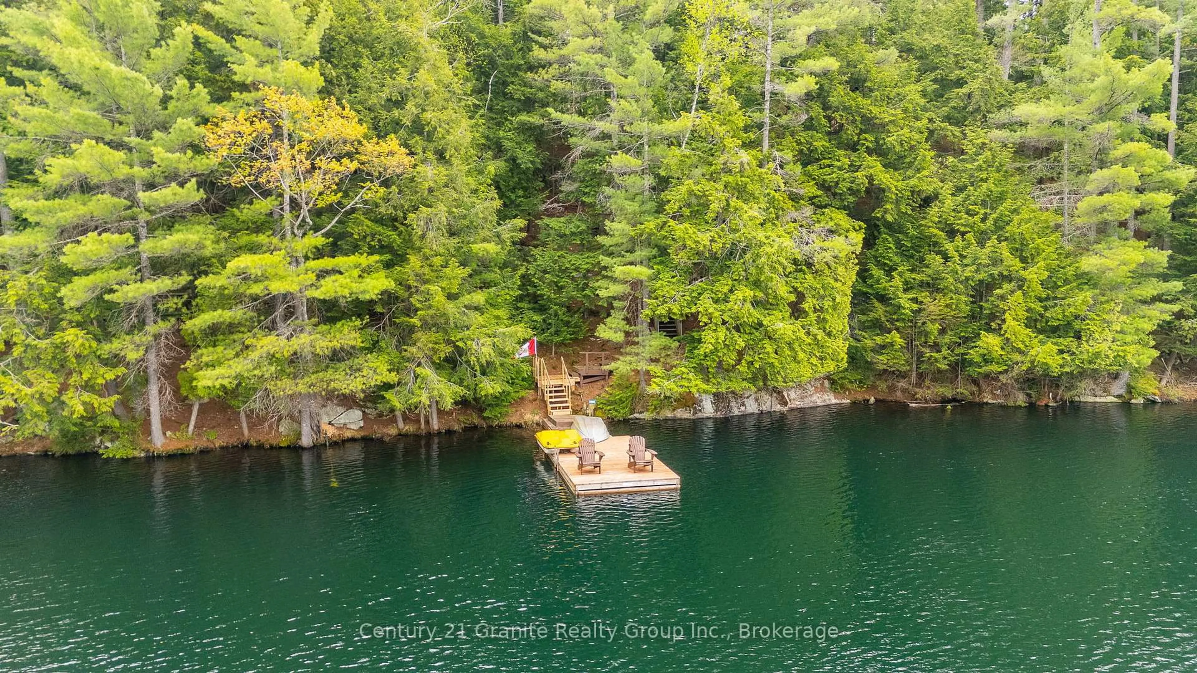 A pic from outside/outdoor area/front of a property/back of a property/a pic from drone, water/lake/river/ocean view for 1153 Bitter Lake Rd, Dysart et al Ontario K0M 1S0