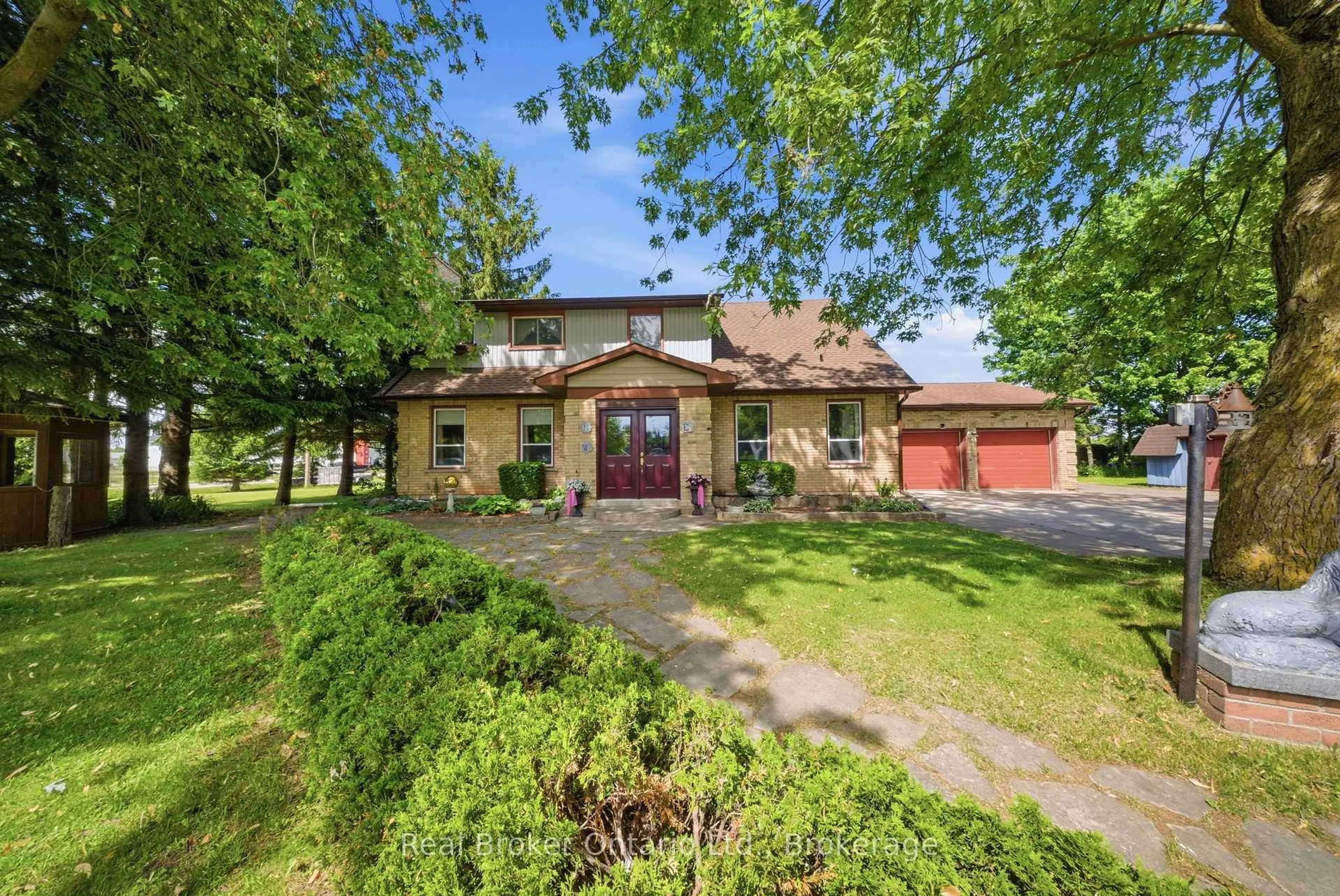 A pic from outside/outdoor area/front of a property/back of a property/a pic from drone, street for 800 Tremaine Ave, North Perth Ontario N4W 3G9