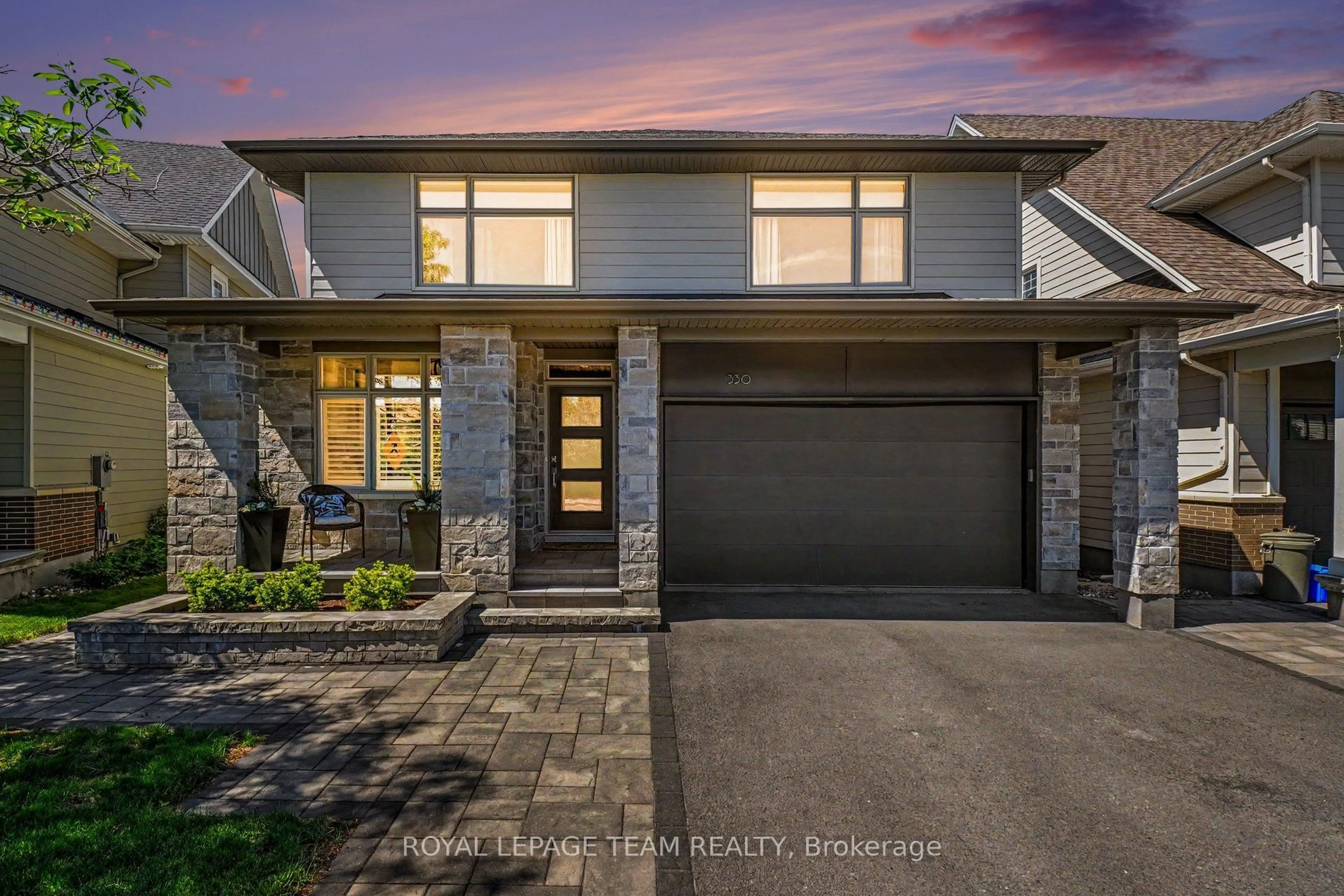 Home with brick exterior material, street for 330 Devonian Way, Ottawa Ontario K2T 0L5