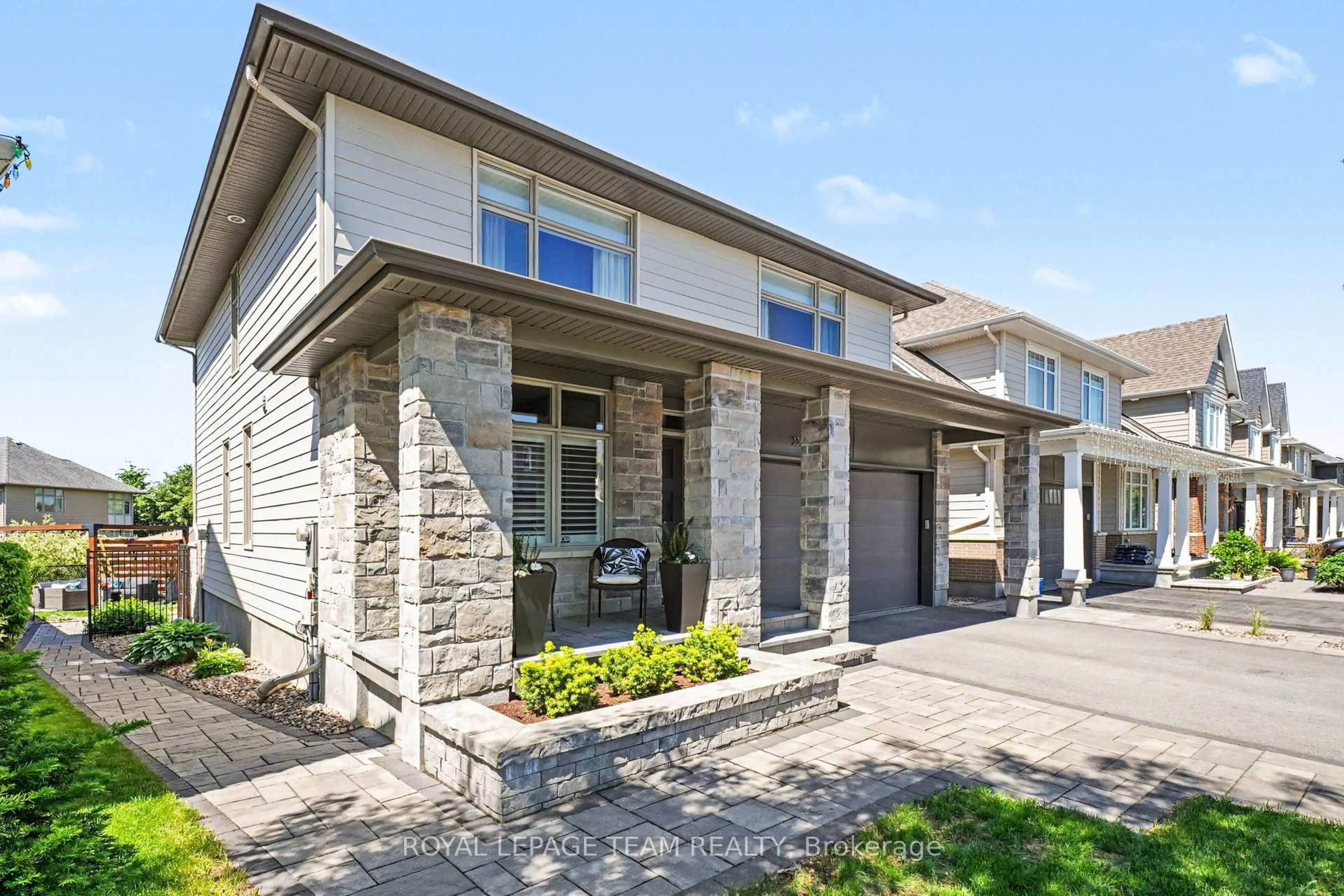 Home with brick exterior material, street for 330 Devonian Way, Ottawa Ontario K2T 0L5