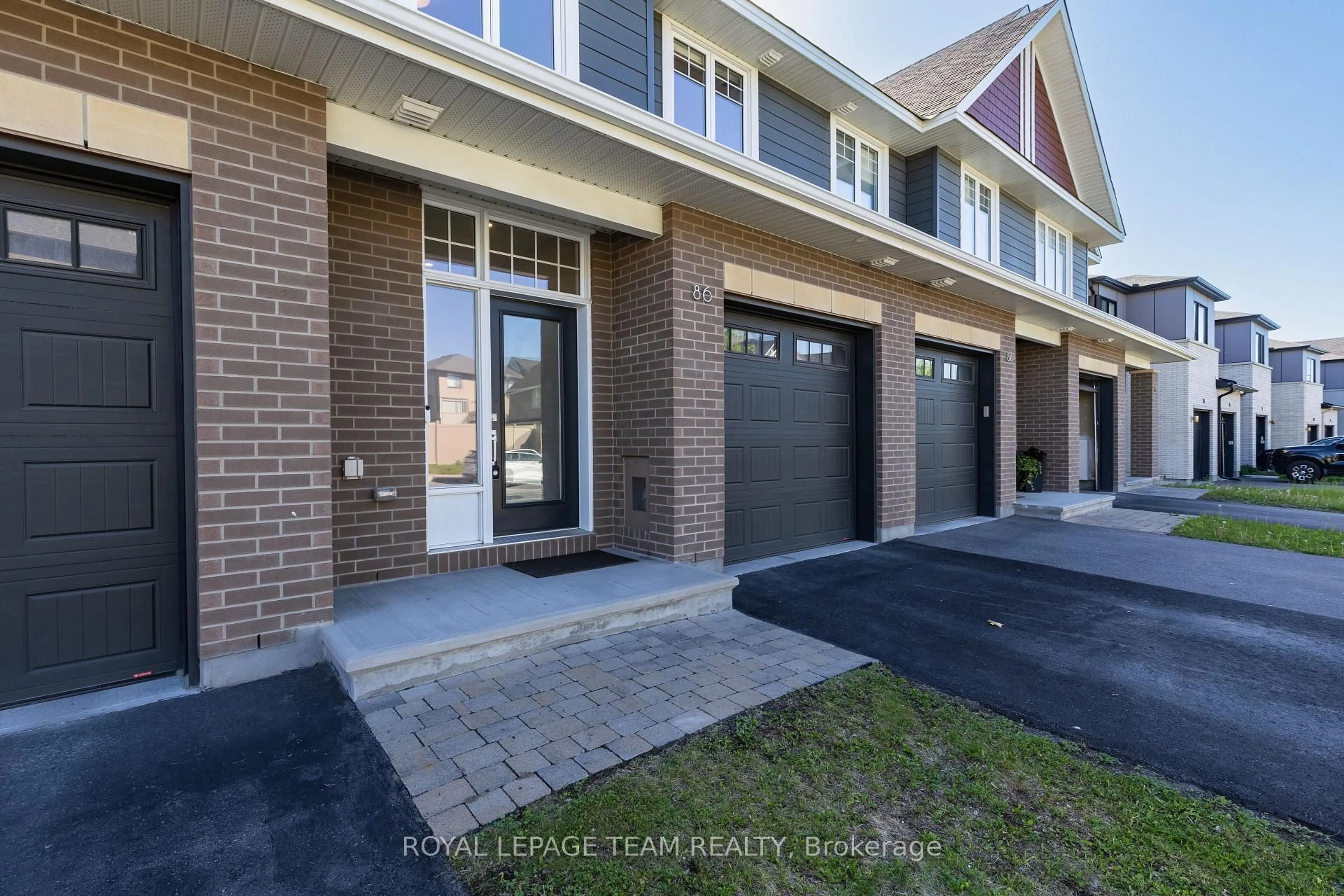 Home with brick exterior material, street for 86 Escarpment Cres, Ottawa Ontario K2T 0L8