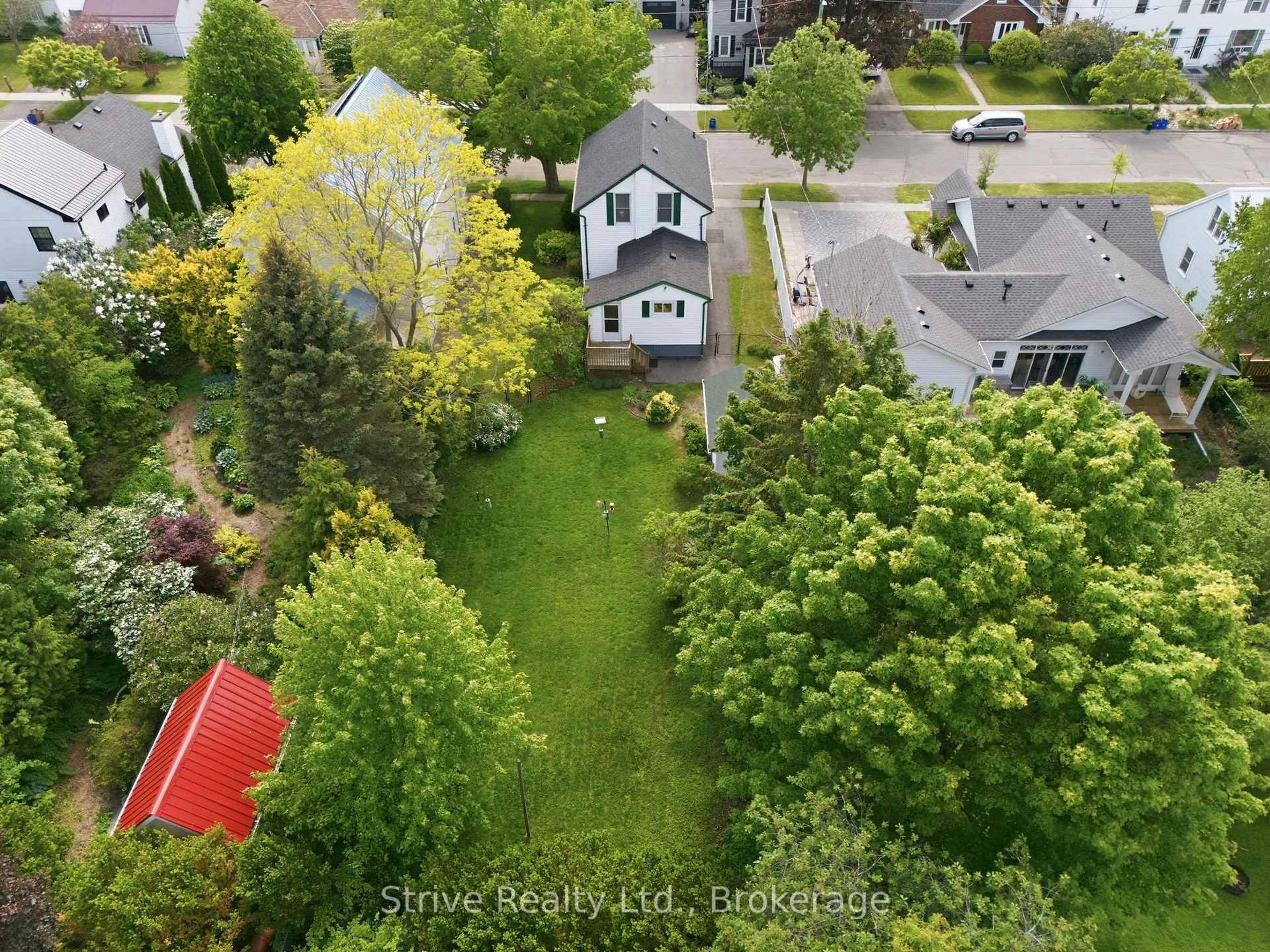 A pic from outside/outdoor area/front of a property/back of a property/a pic from drone, street for 158 Stuart St, Cobourg Ontario K9A 2Y2