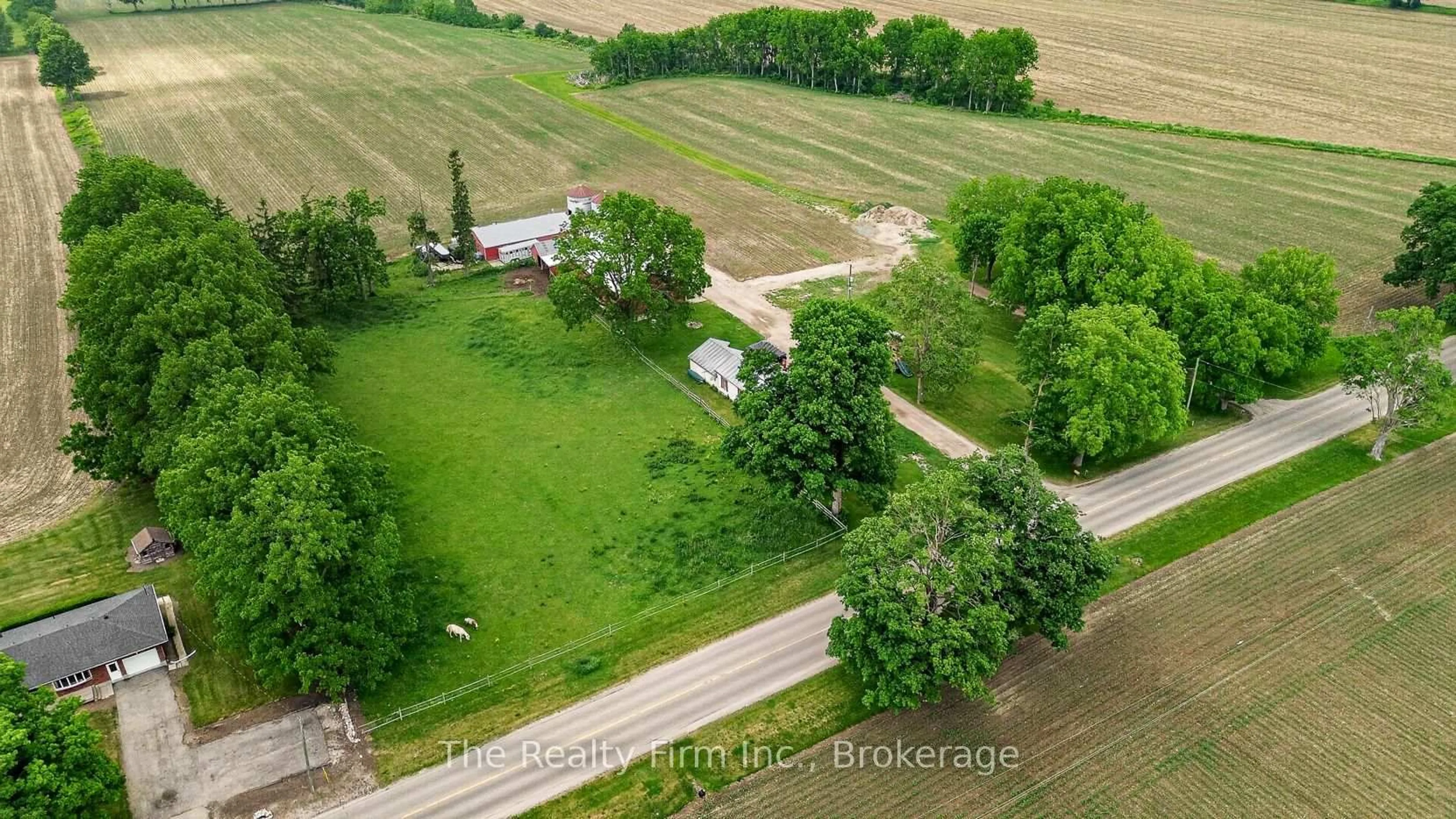 A pic from outside/outdoor area/front of a property/back of a property/a pic from drone, street for 564207 Karn Rd, South-West Oxford Ontario N5C 3J5