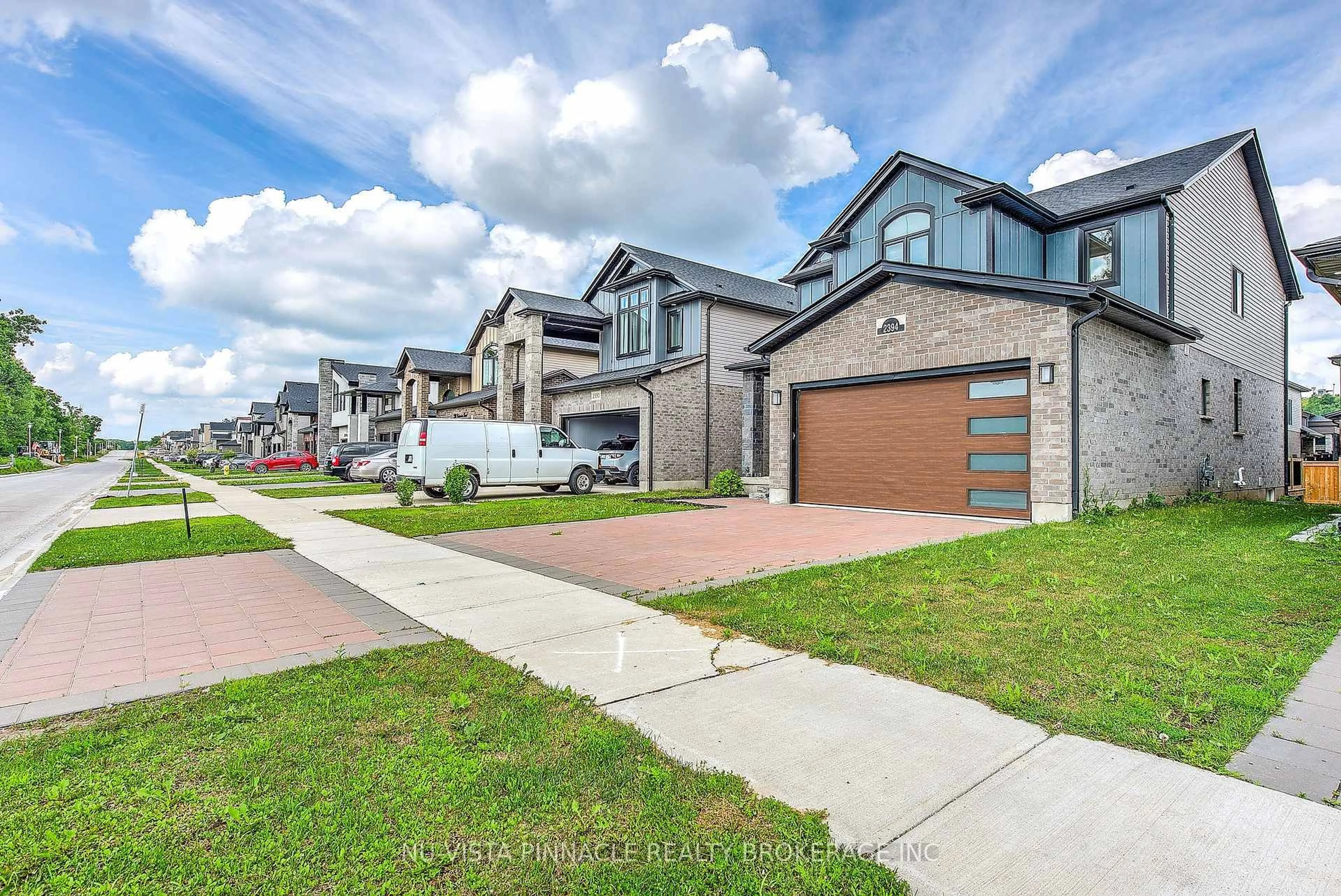 A pic from outside/outdoor area/front of a property/back of a property/a pic from drone, street for 2394 WICKERSON Rd, London South Ontario N6K 0B9