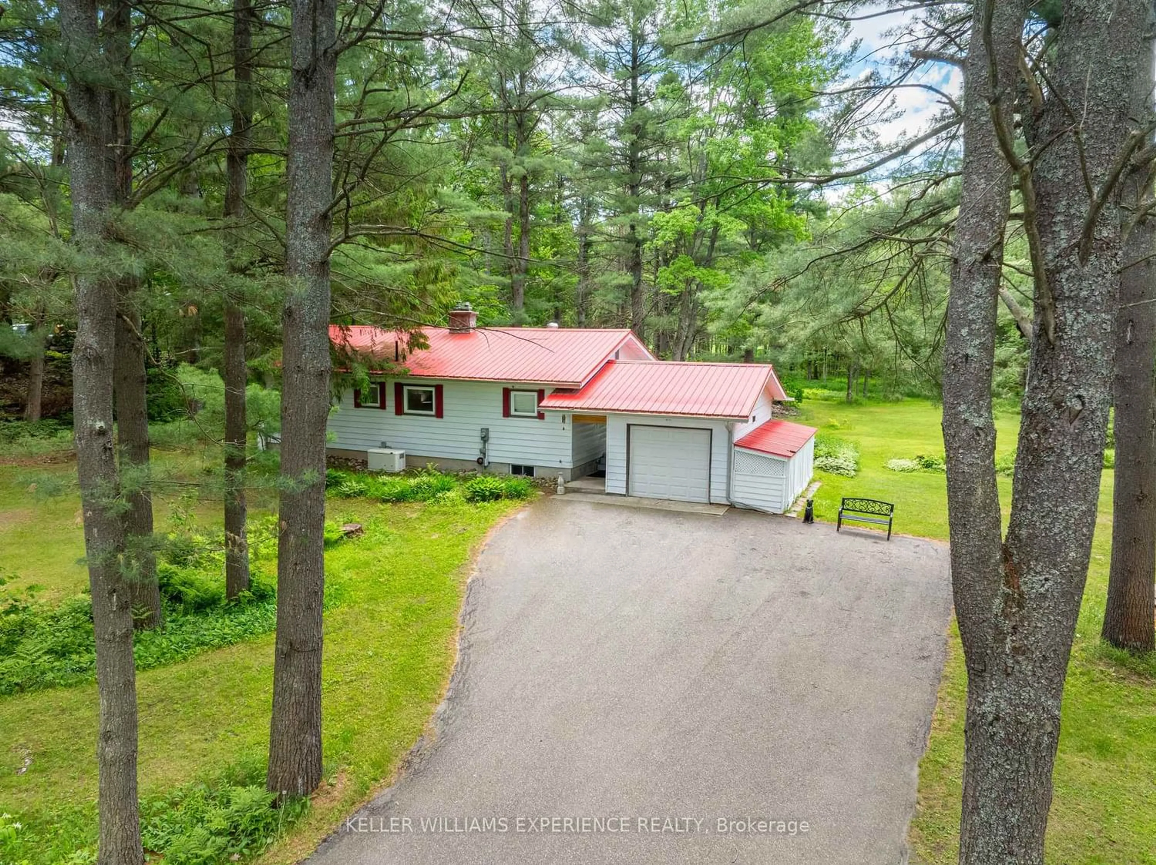 A pic from outside/outdoor area/front of a property/back of a property/a pic from drone, forest/trees view for 1060 South Kahshe Lake Rd, Gravenhurst Ontario P0E 1G0