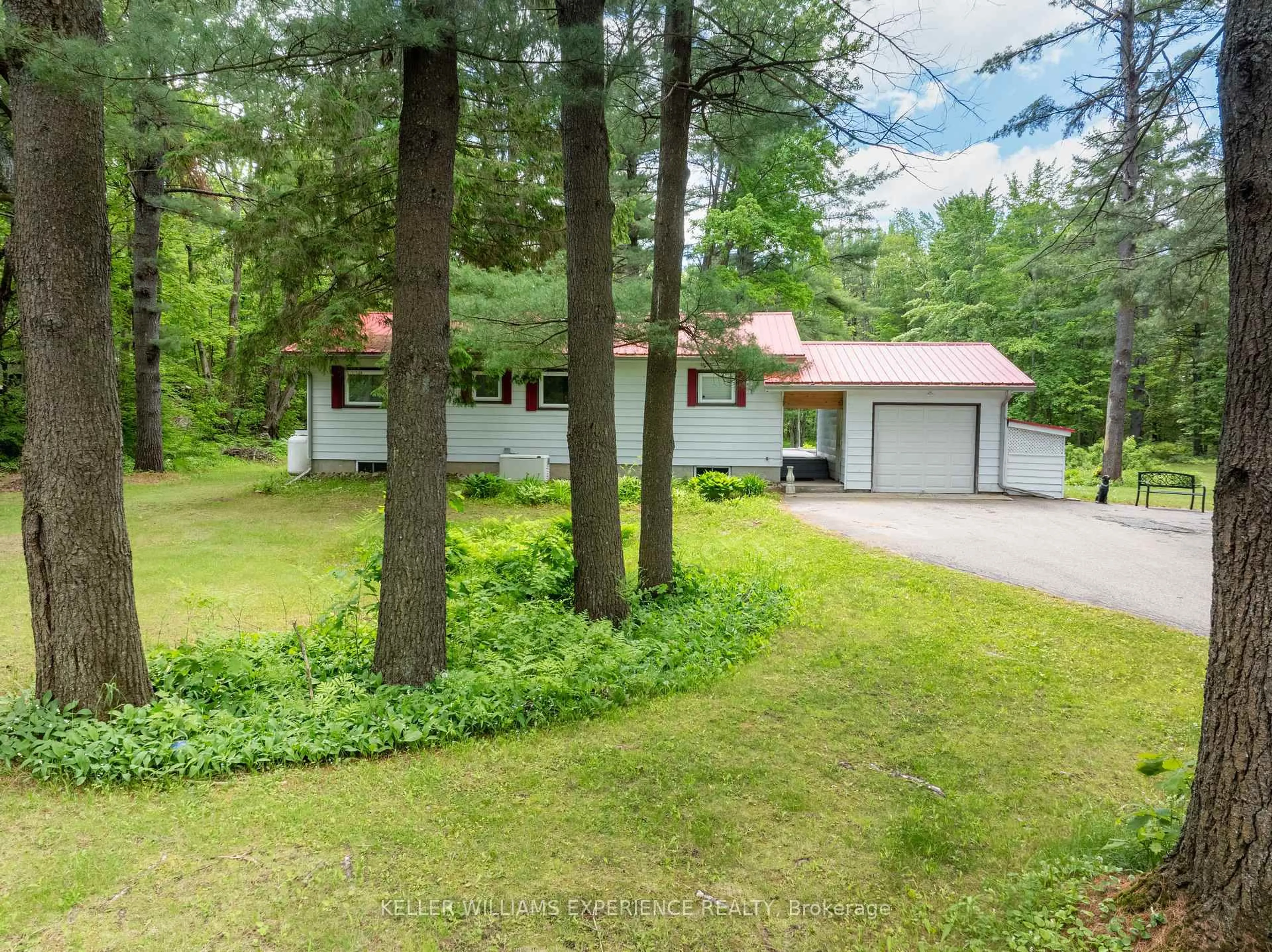 A pic from outside/outdoor area/front of a property/back of a property/a pic from drone, forest/trees view for 1060 South Kahshe Lake Rd, Gravenhurst Ontario P0E 1G0