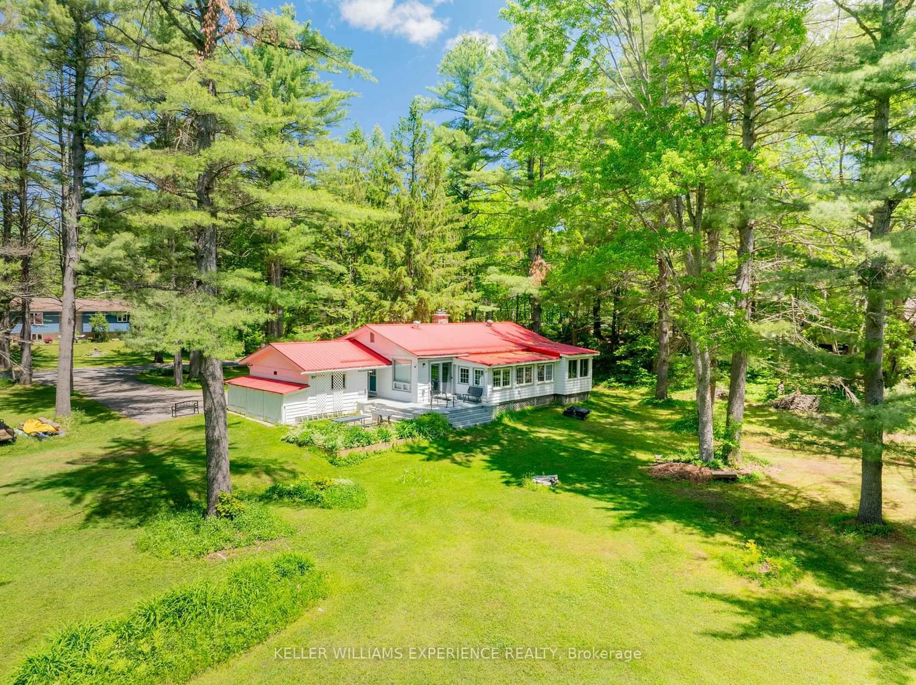 A pic from outside/outdoor area/front of a property/back of a property/a pic from drone, forest/trees view for 1060 South Kahshe Lake Rd, Gravenhurst Ontario P0E 1G0