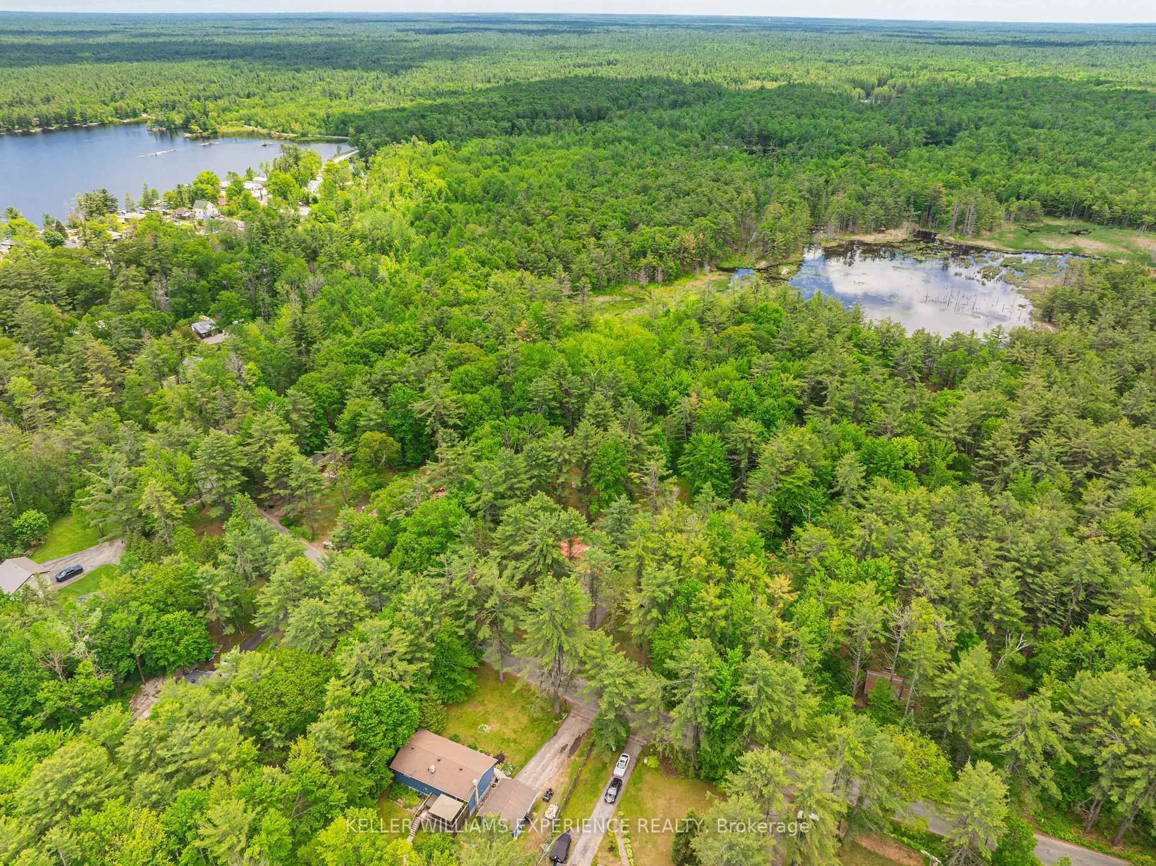 A pic from outside/outdoor area/front of a property/back of a property/a pic from drone, water/lake/river/ocean view for 1060 South Kahshe Lake Rd, Gravenhurst Ontario P0E 1G0