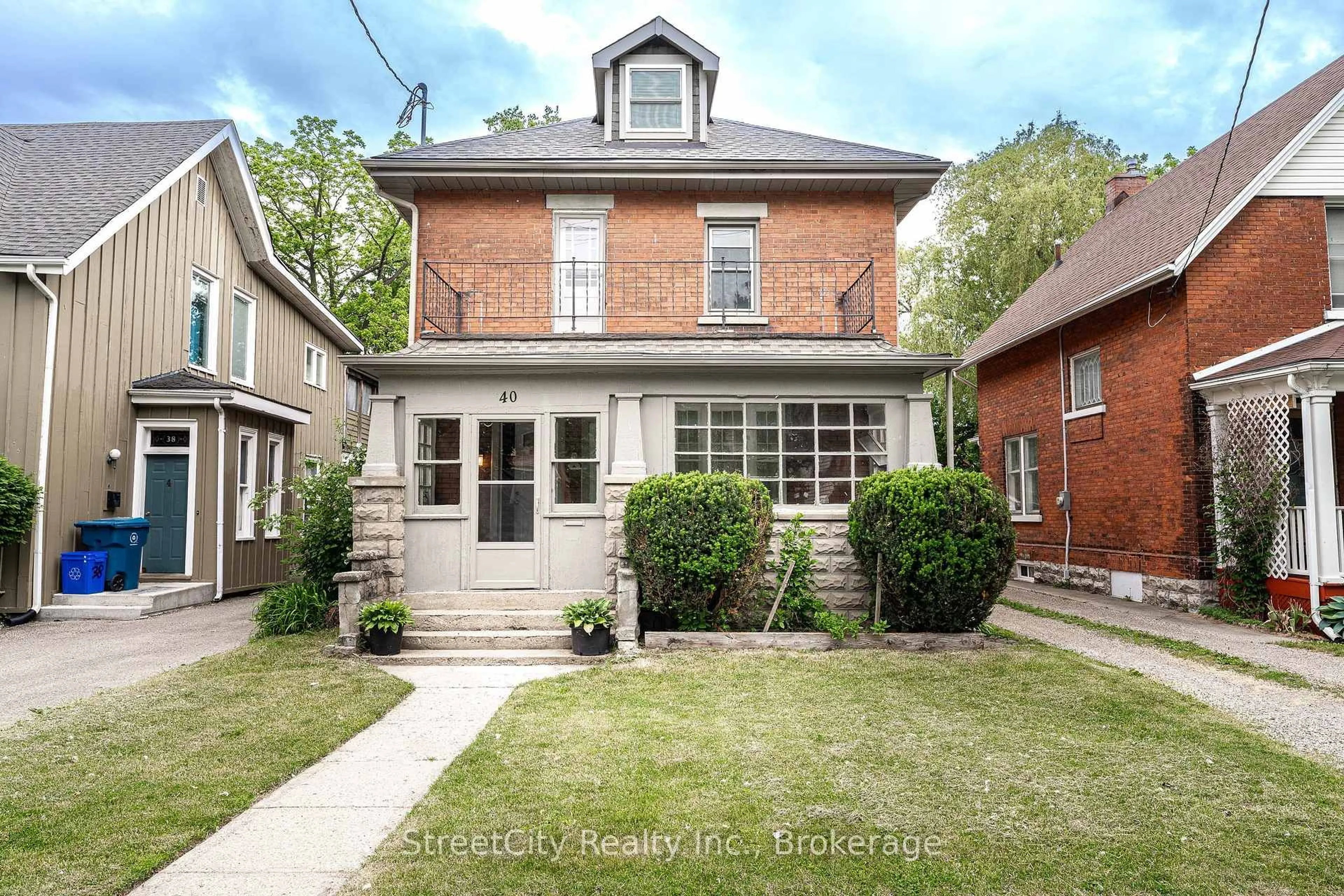 Home with brick exterior material, street for 40 Douro St, Stratford Ontario N5A 3R3