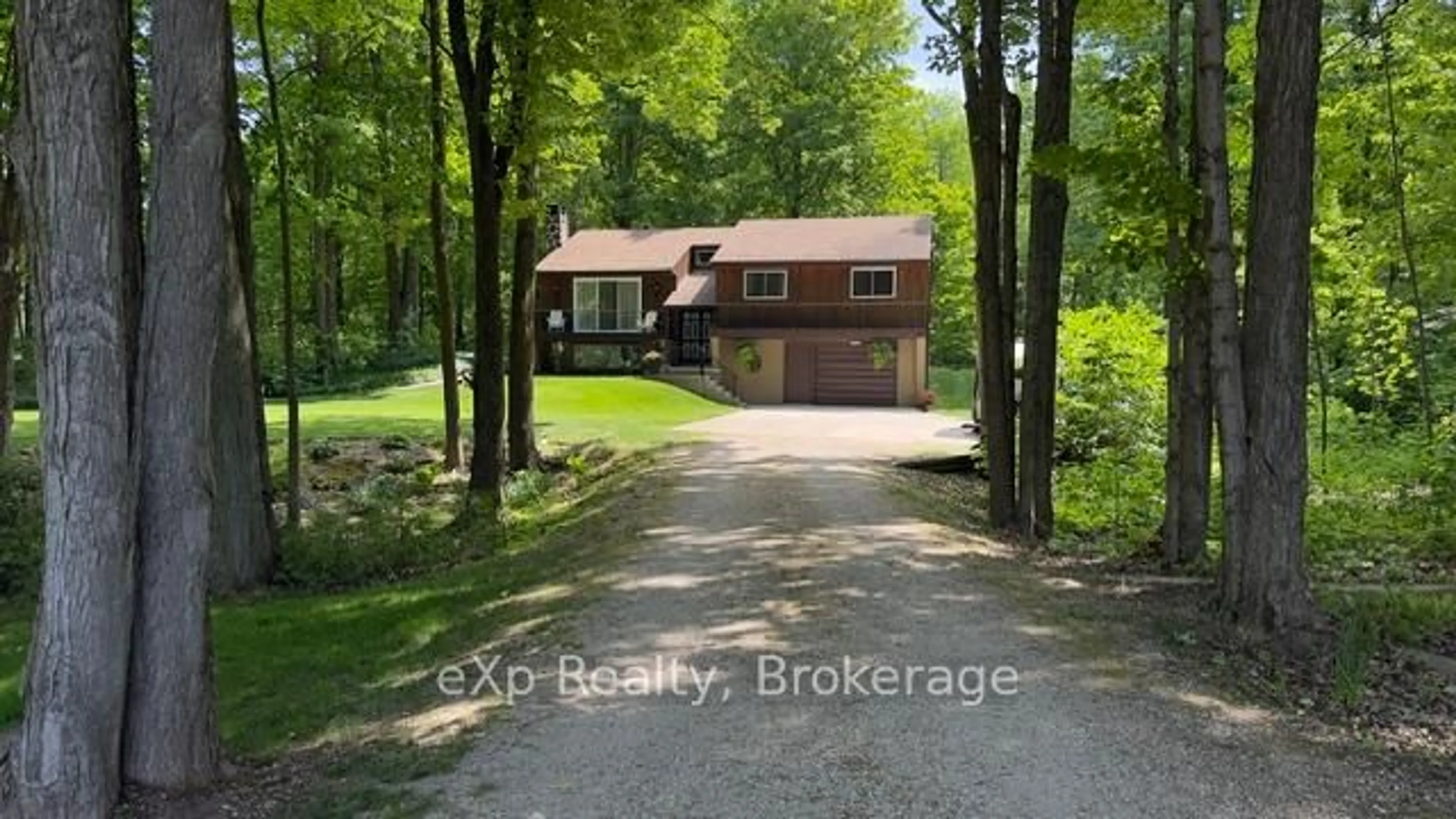 A pic from outside/outdoor area/front of a property/back of a property/a pic from drone, unknown for 113 Country Lane Rd, West Grey Ontario N0G 1S0