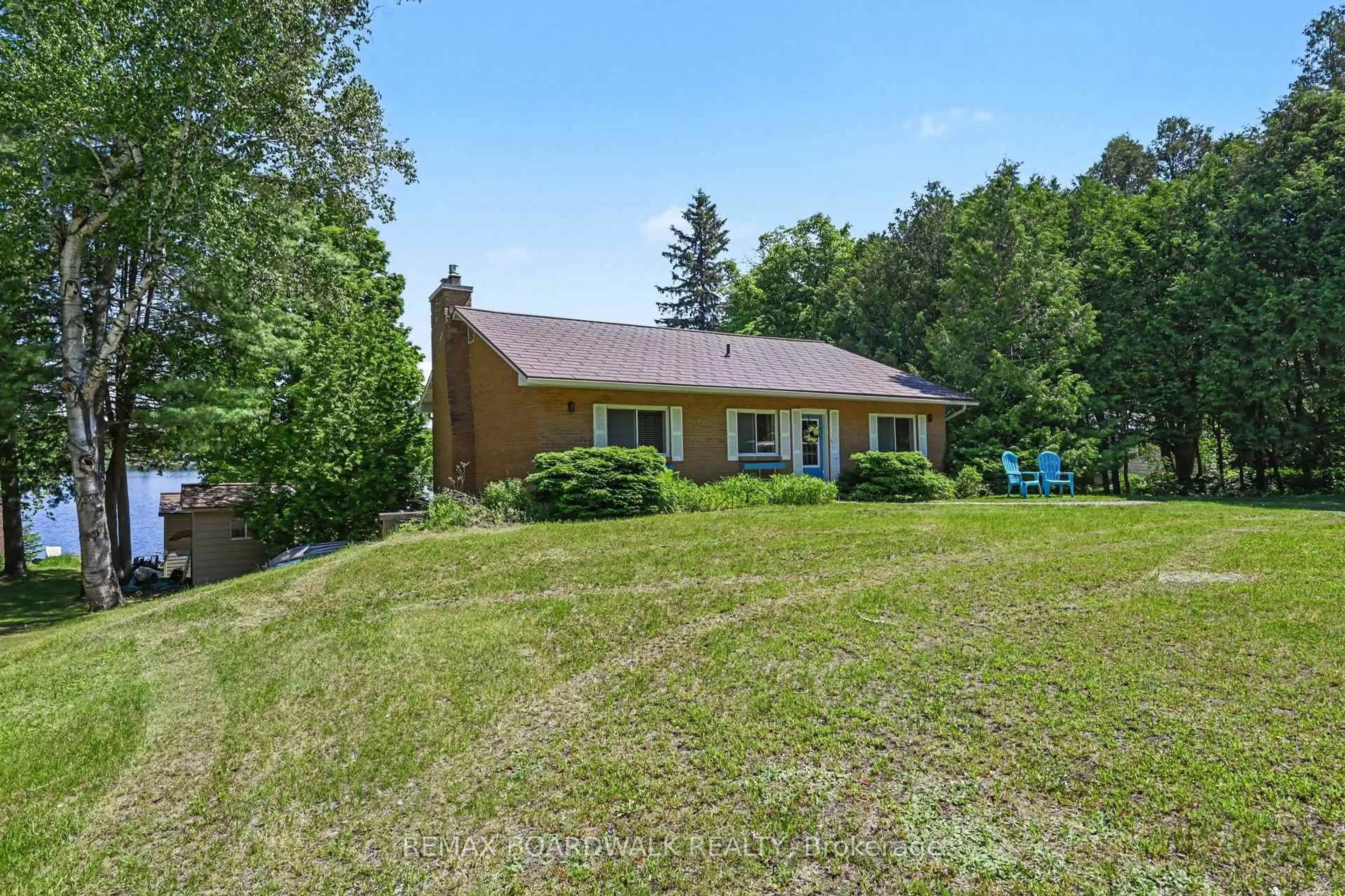 A pic from outside/outdoor area/front of a property/back of a property/a pic from drone, water/lake/river/ocean view for 126 Lakeshore Dr, White Lake Ontario K0A 3L0