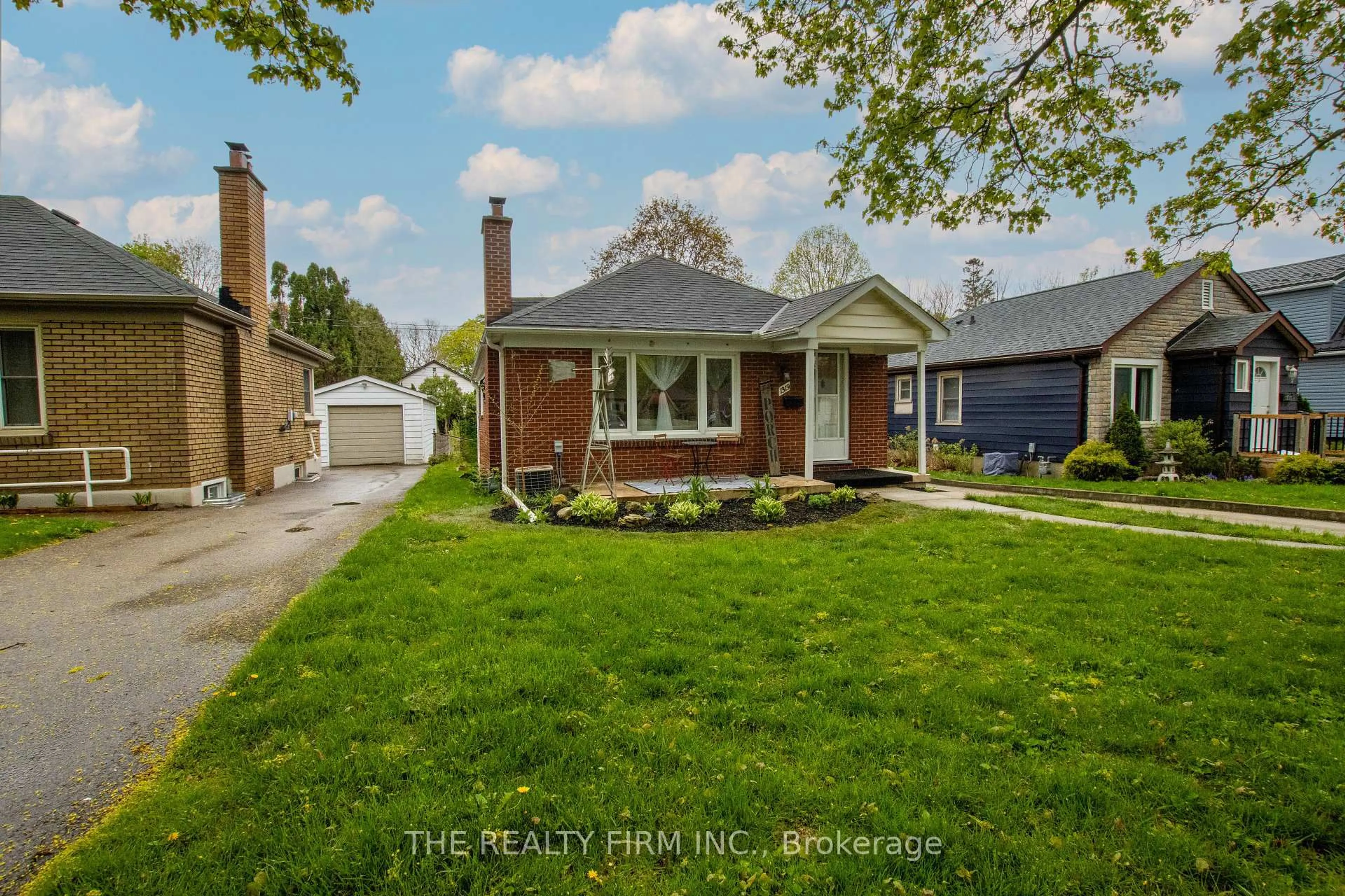 Home with brick exterior material, street for 1319 Wilton Ave, London East Ontario N5W 2H5