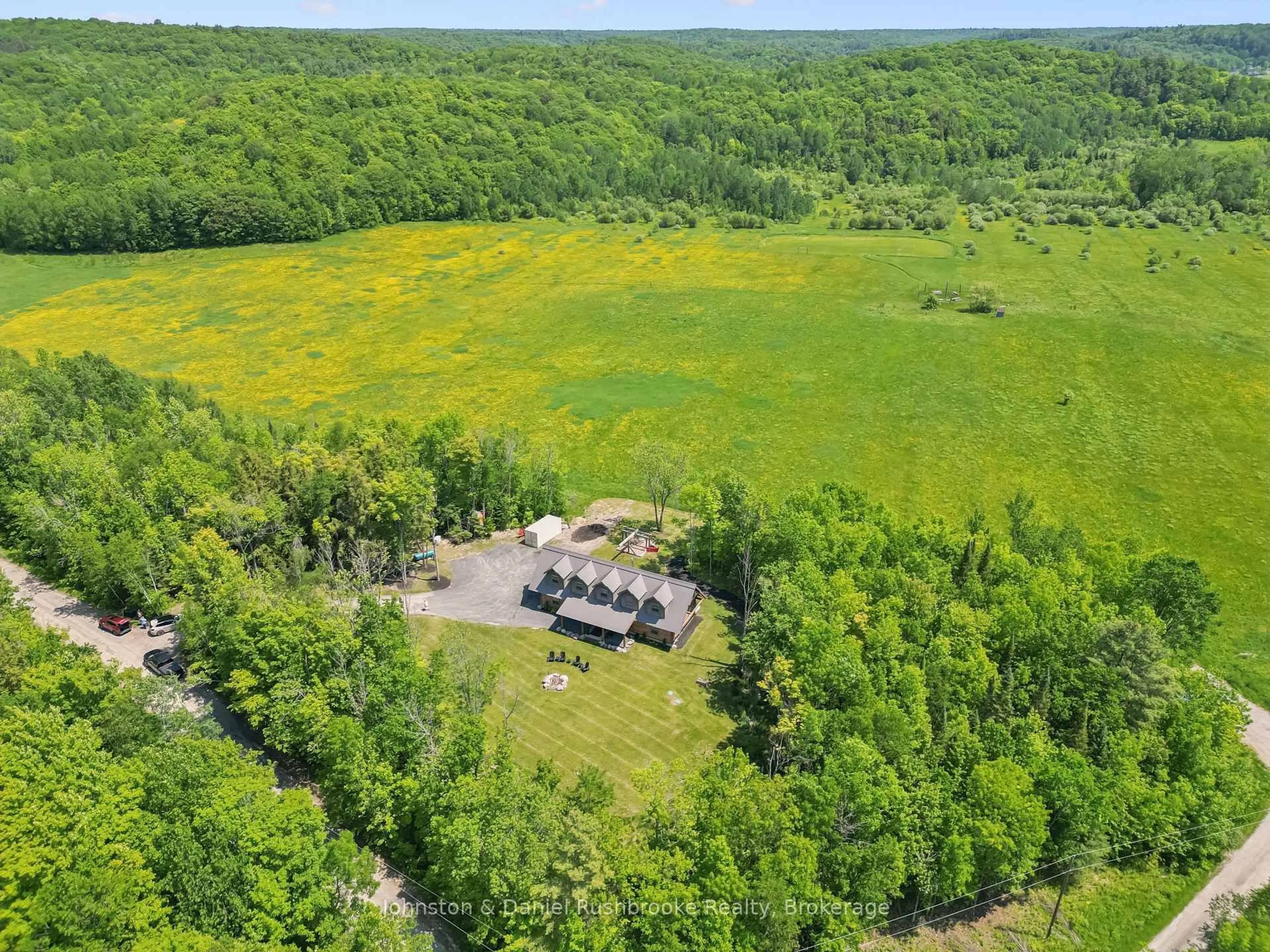 A pic from outside/outdoor area/front of a property/back of a property/a pic from drone, forest/trees view for 1105 ECHO BEACH Rd, Muskoka Lakes Ontario P0B 1M0