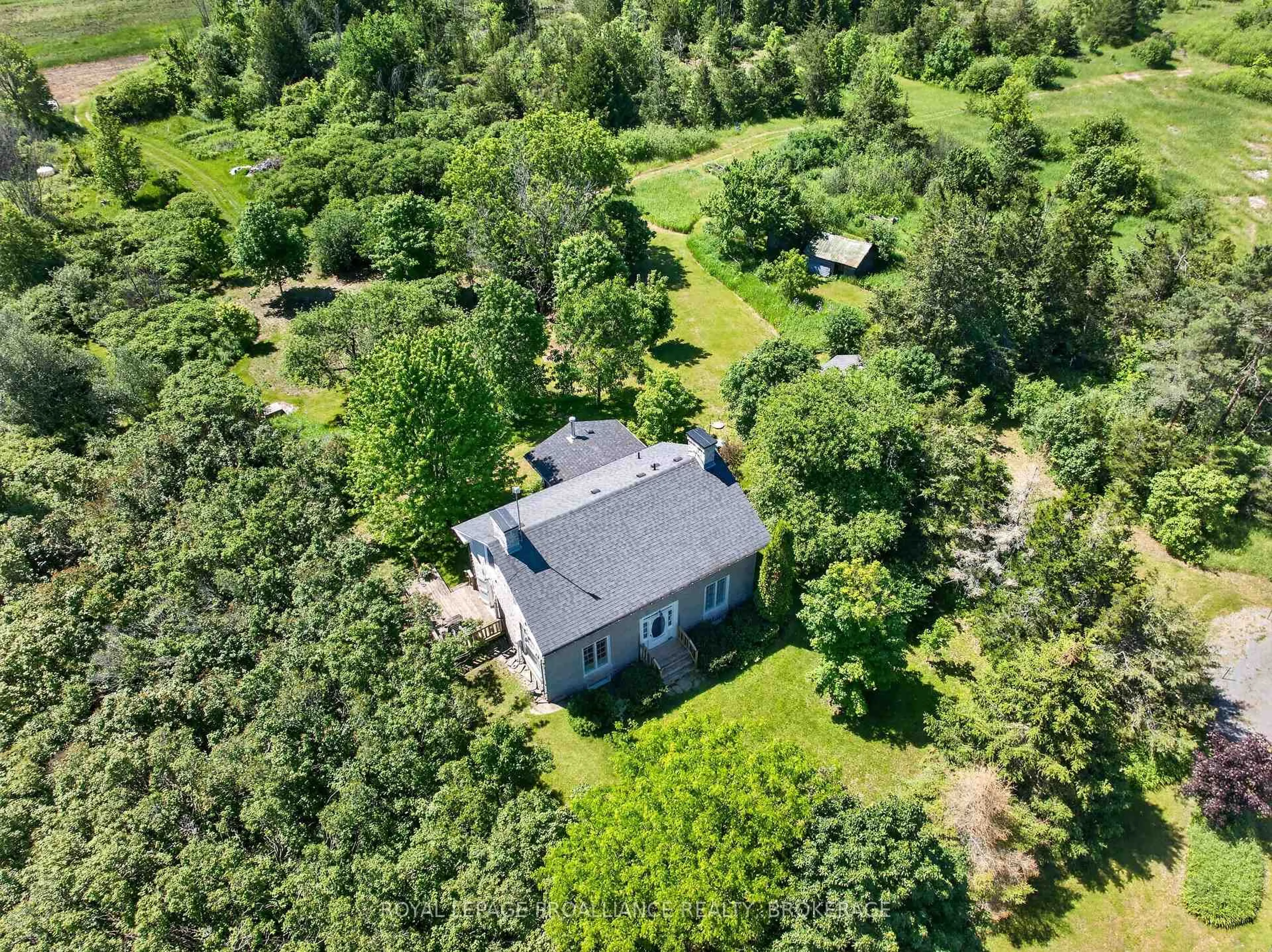 A pic from outside/outdoor area/front of a property/back of a property/a pic from drone, forest/trees view for 734 Fred Brown Rd, Bissett Creek Ontario K0H 2H0