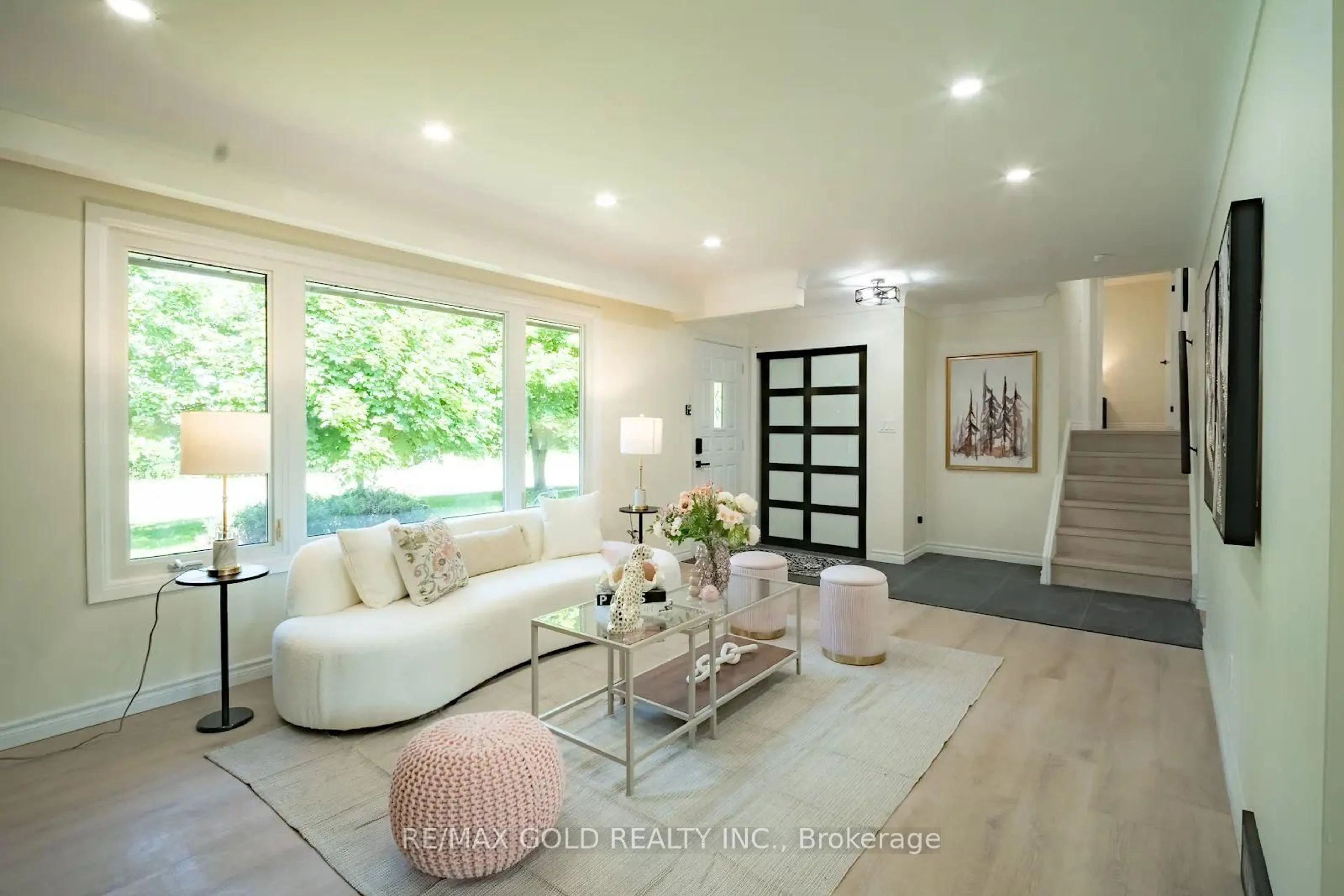 Living room with furniture, wood/laminate floor for 4682 Pinedale Dr, Niagara Falls Ontario L2E 6M8