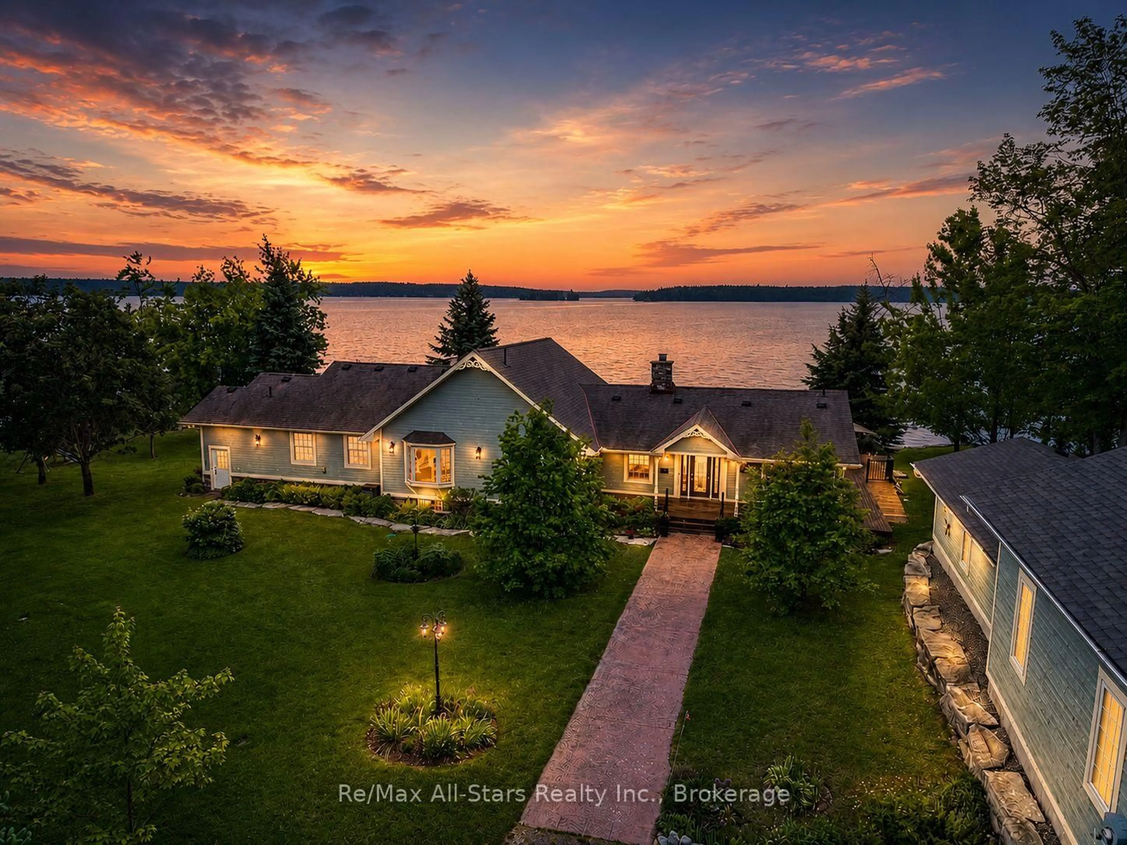 A pic from outside/outdoor area/front of a property/back of a property/a pic from drone, water/lake/river/ocean view for 32 Fire Route 103H, Trent Lakes Ontario K0M 1A0