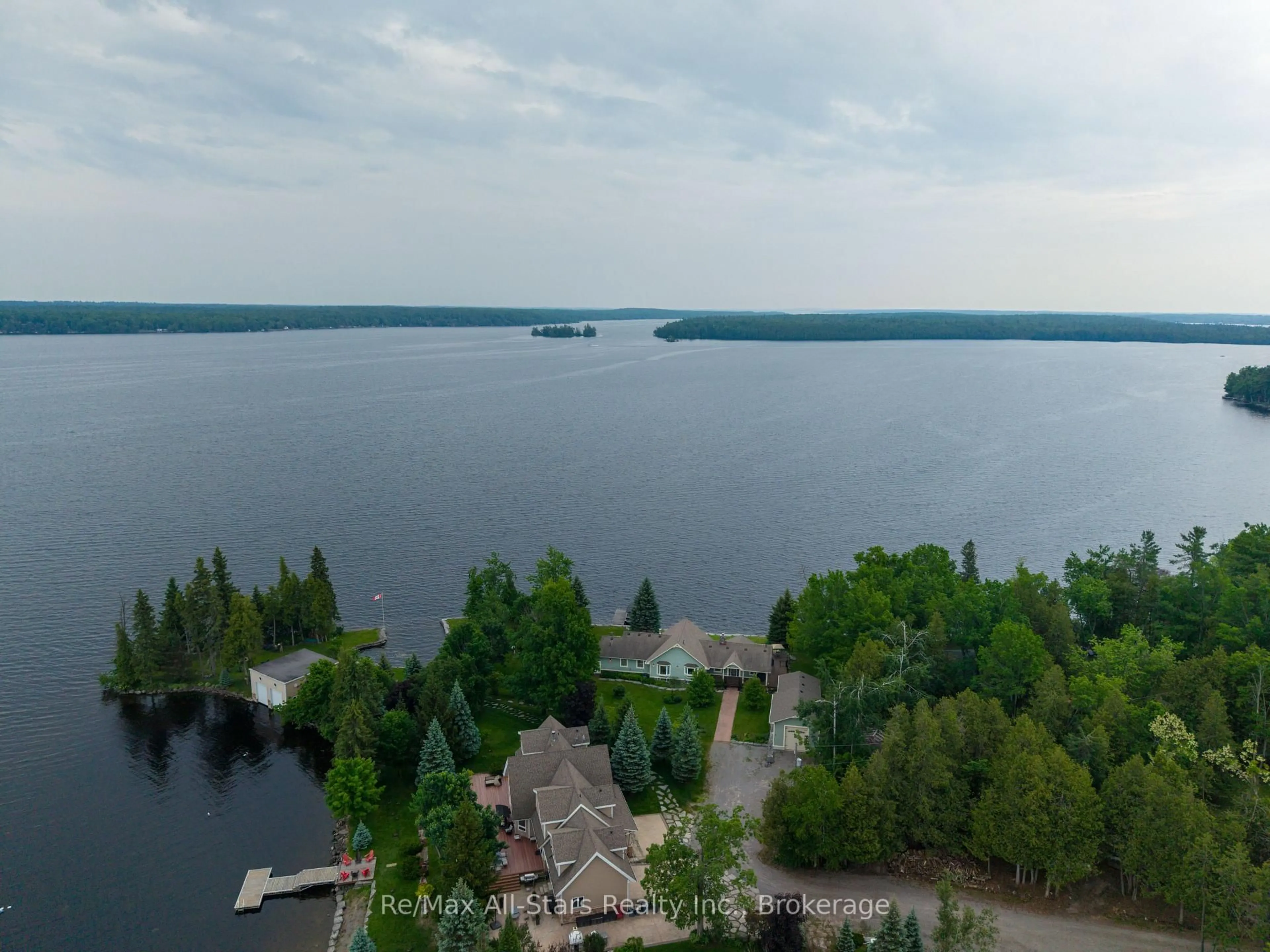 A pic from outside/outdoor area/front of a property/back of a property/a pic from drone, water/lake/river/ocean view for 32 Fire Route 103H, Trent Lakes Ontario K0M 1A0
