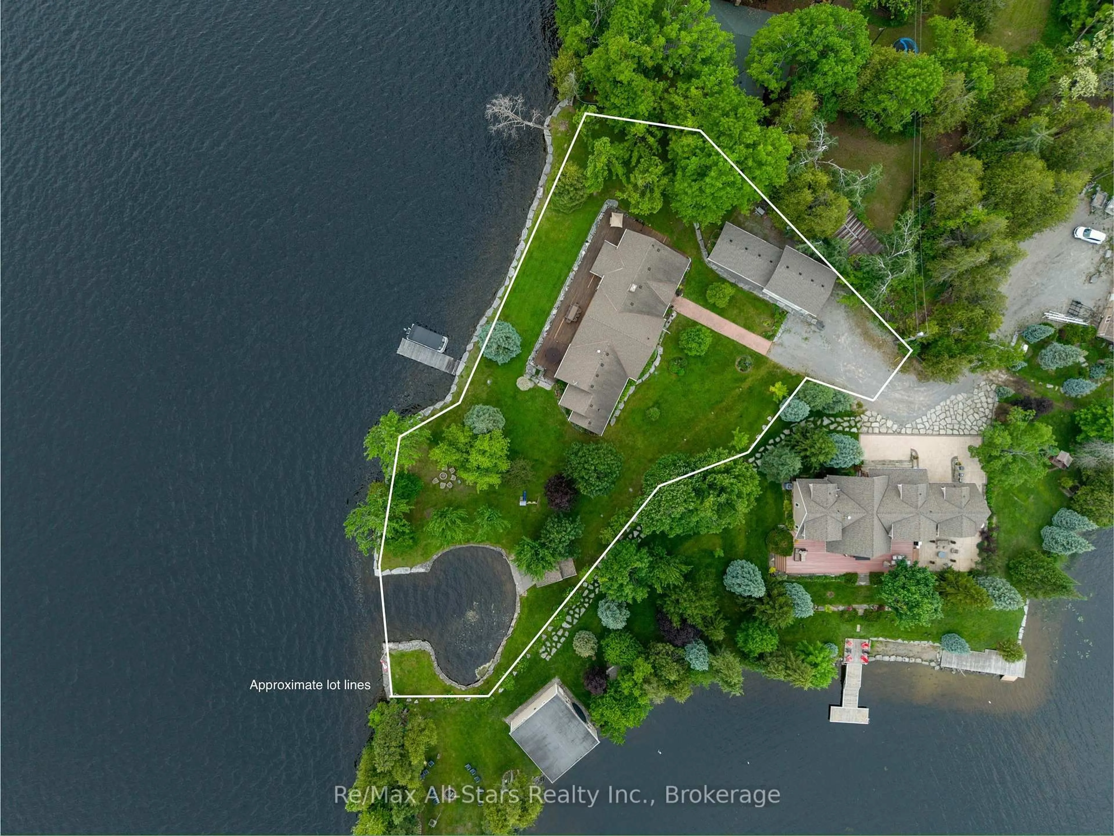 A pic from outside/outdoor area/front of a property/back of a property/a pic from drone, water/lake/river/ocean view for 32 Fire Route 103H, Trent Lakes Ontario K0M 1A0