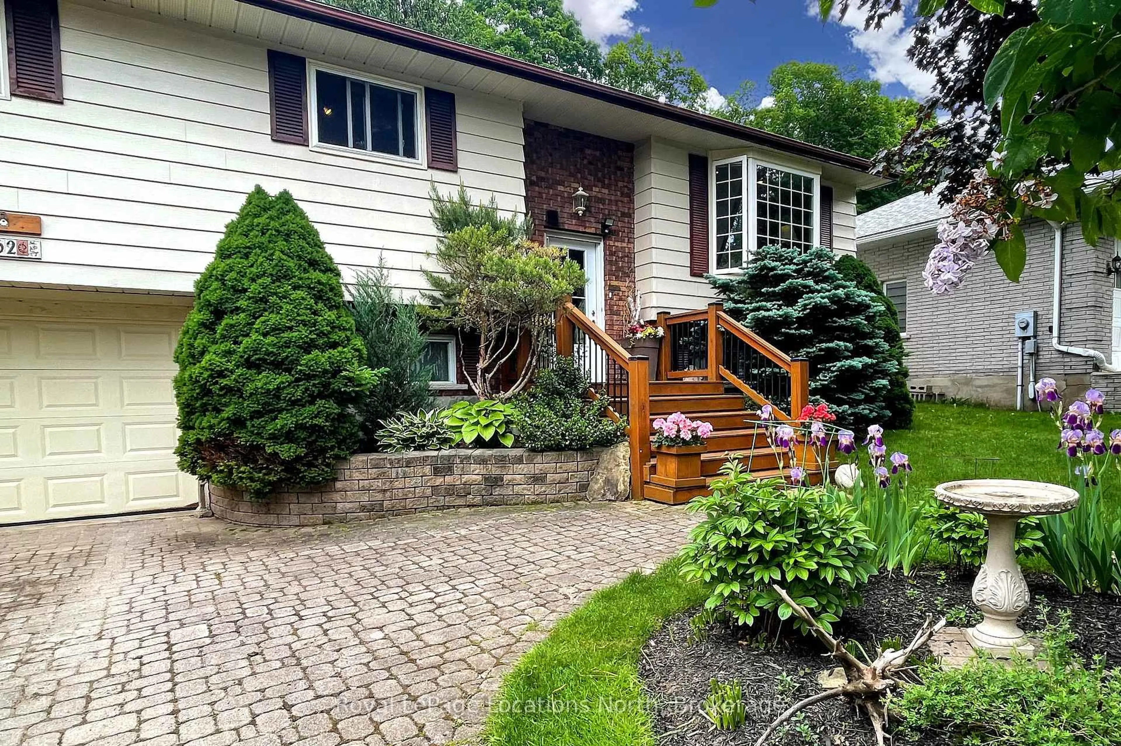 Home with brick exterior material, street for 62 Parklane Cres, Meaford Ontario N4L 1B1