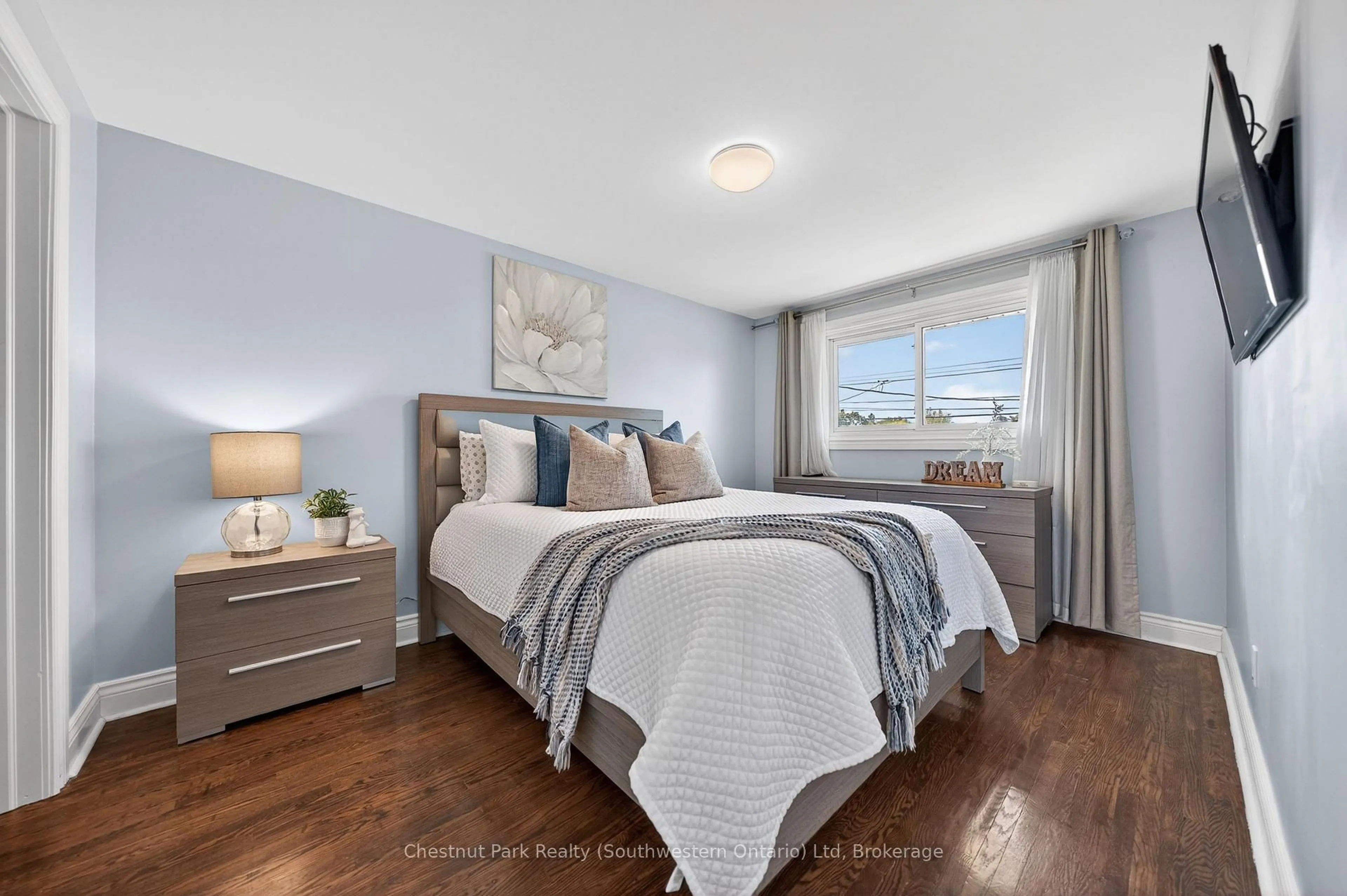 Bedroom with bed, wood/laminate floor for 170 Willow Rd, Guelph Ontario N1H 1W8