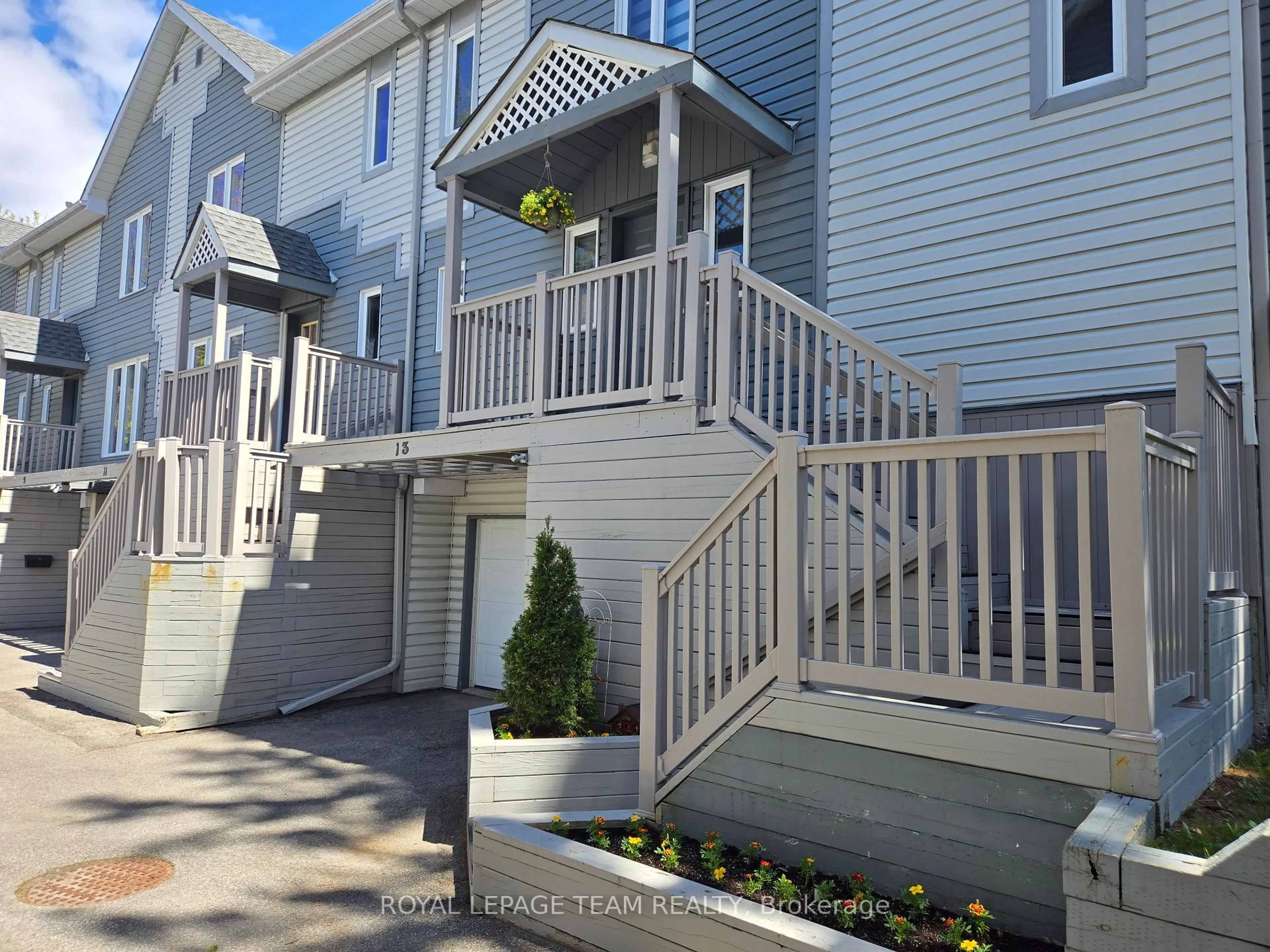 Home with vinyl exterior material, street for 817 High St #13, Ottawa Ontario K2B 6C3
