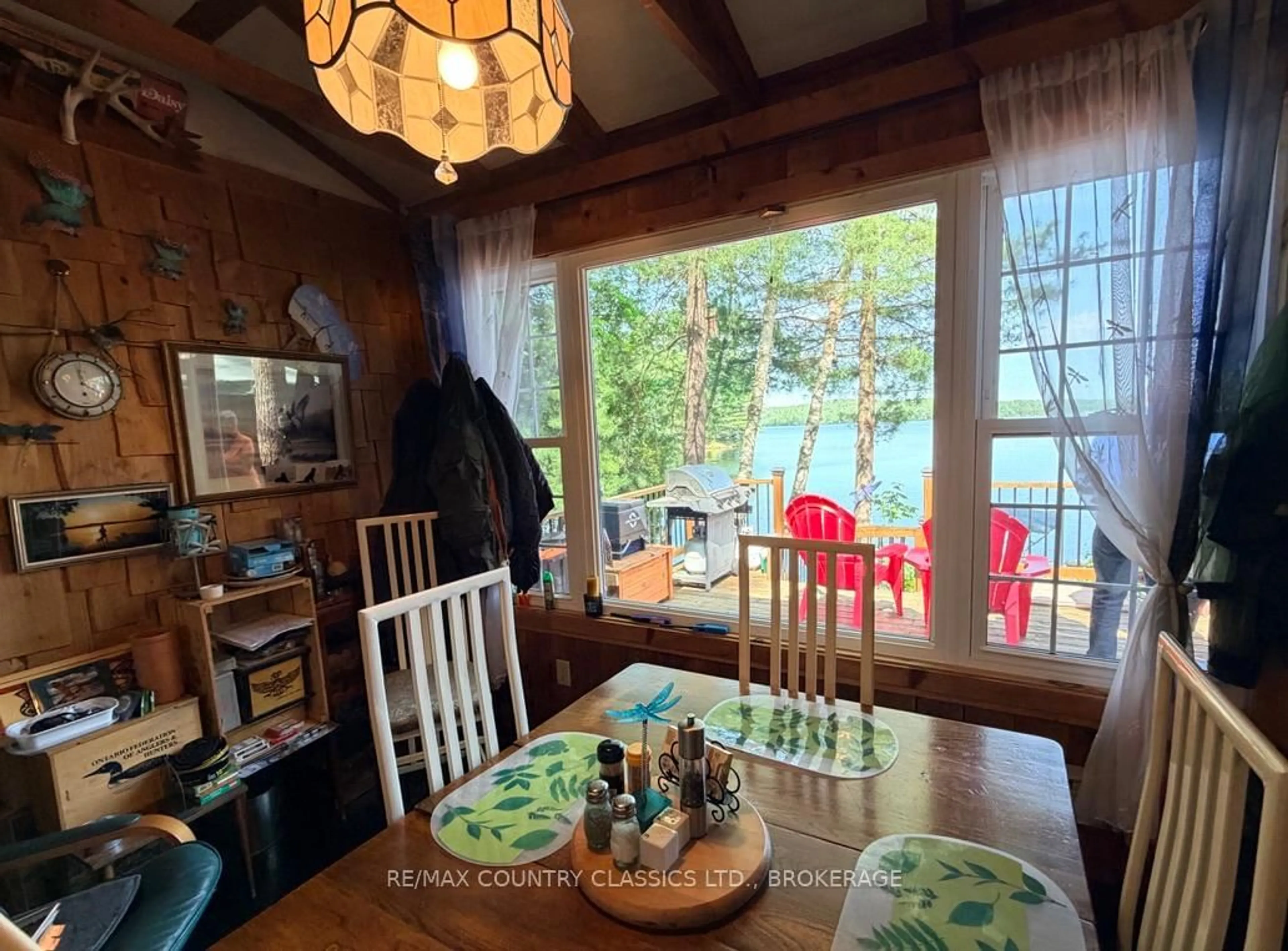Dining room, wood/laminate floor for 3430 Shabomeka Lake, Cloyne Ontario K0H 1K0