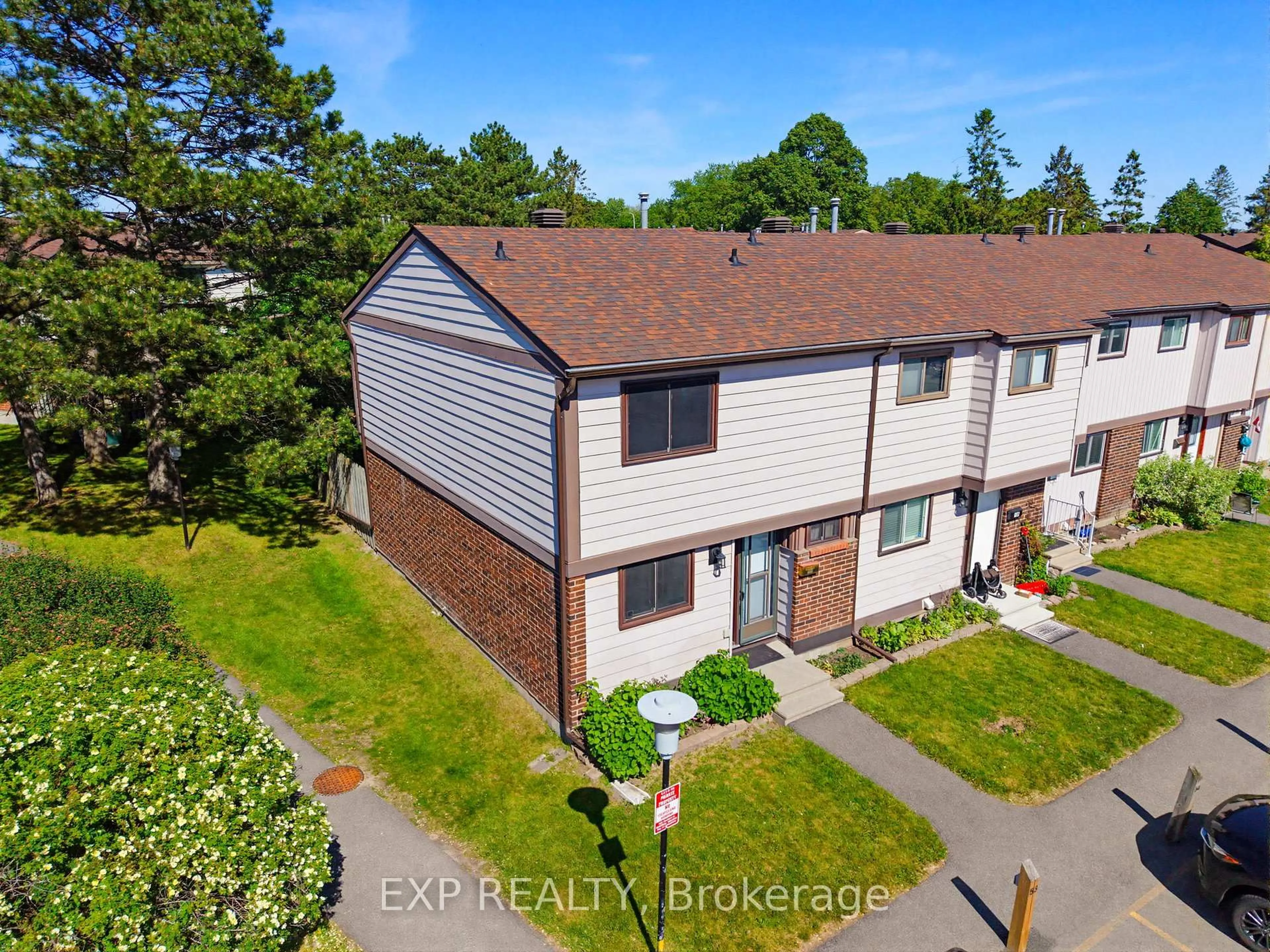 A pic from outside/outdoor area/front of a property/back of a property/a pic from drone, street for 10 Fieldgate Dr #A, Ottawa Ontario K2J 1L5