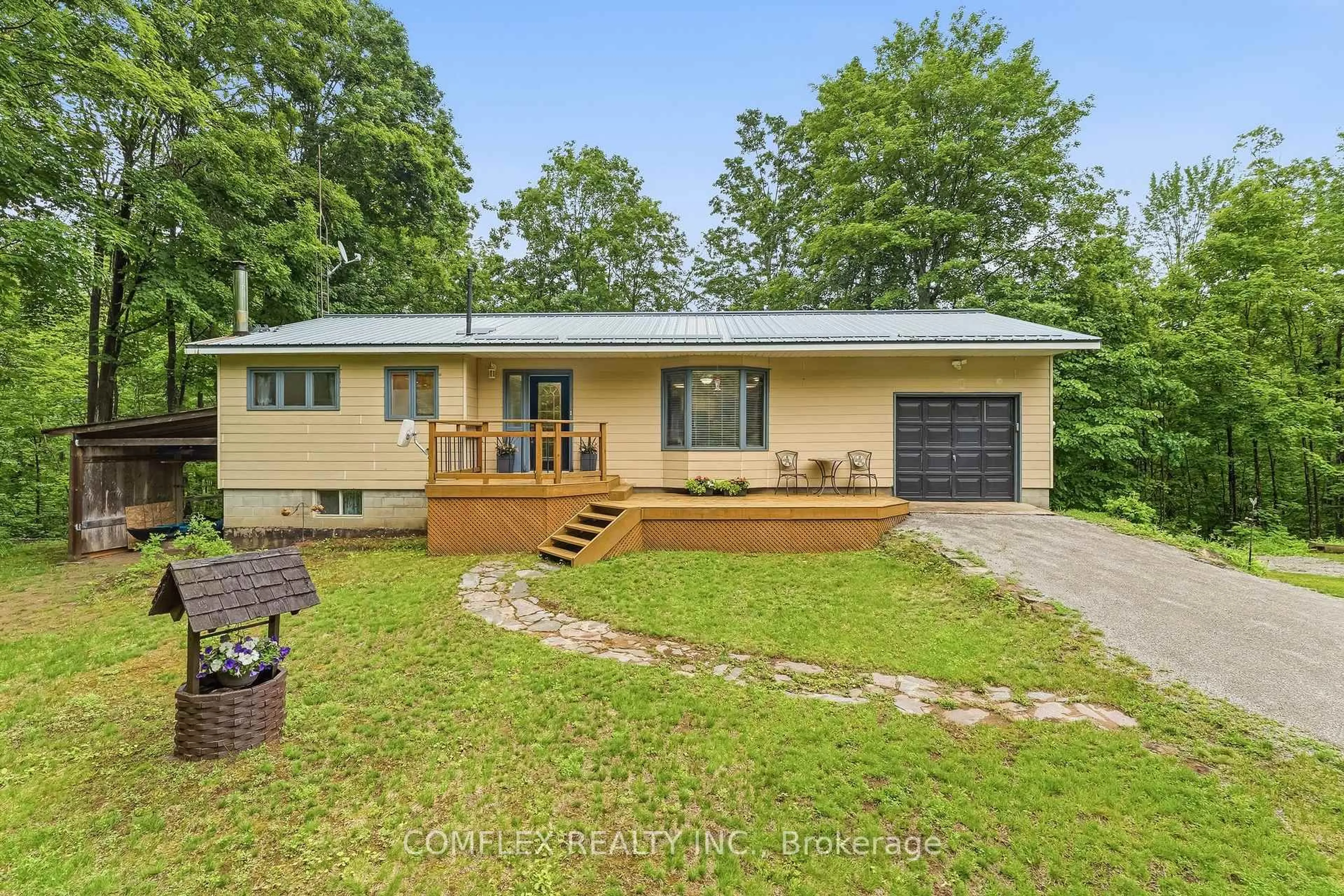 A pic from outside/outdoor area/front of a property/back of a property/a pic from drone, unknown for 1354 Clear Lake Rd, Minden Hills Ontario K0M 2L1