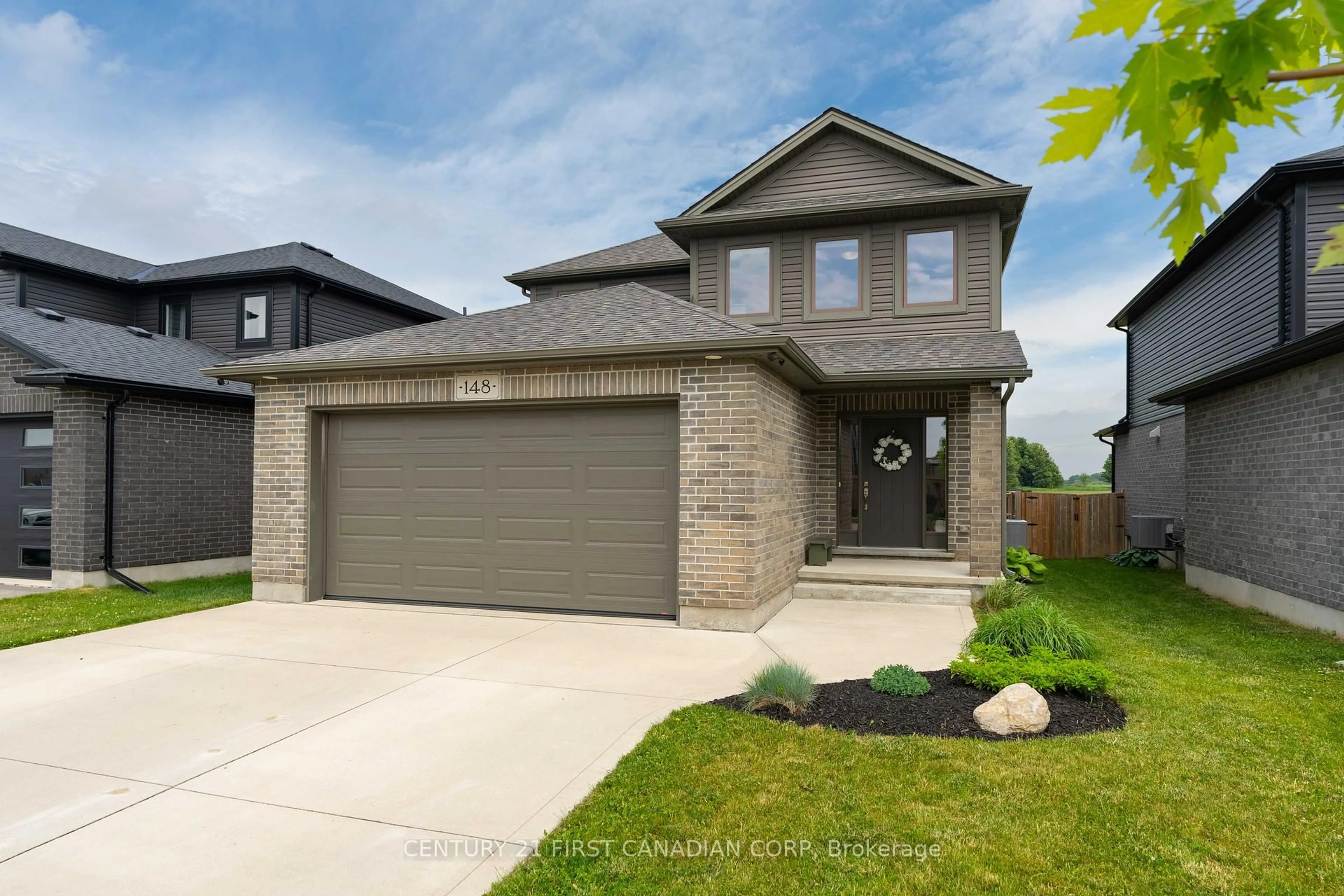 Home with brick exterior material, street for 148 Gilmour Dr, Lucan Biddulph Ontario N0M 2J0