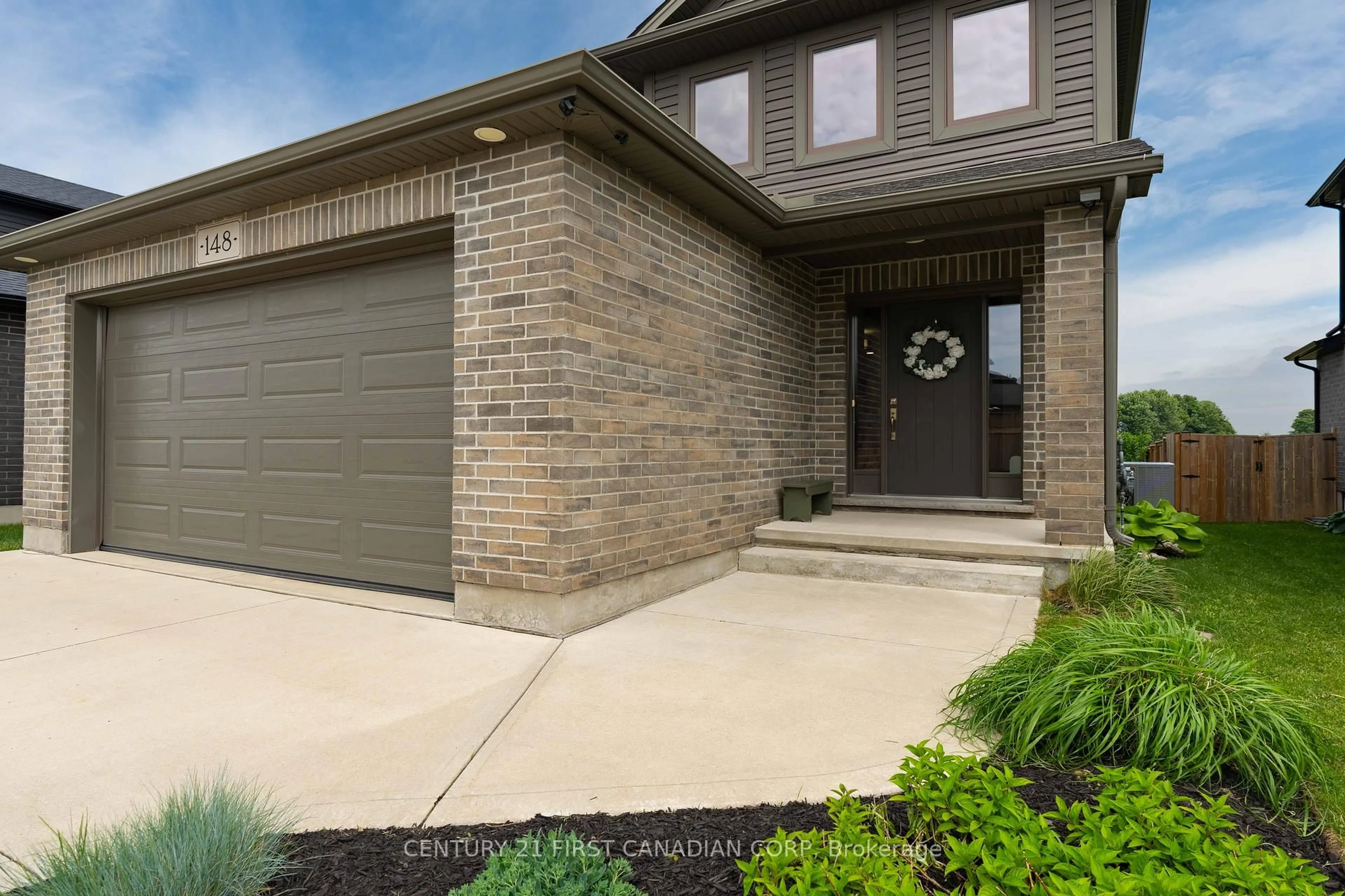 Home with brick exterior material, street for 148 Gilmour Dr, Lucan Biddulph Ontario N0M 2J0