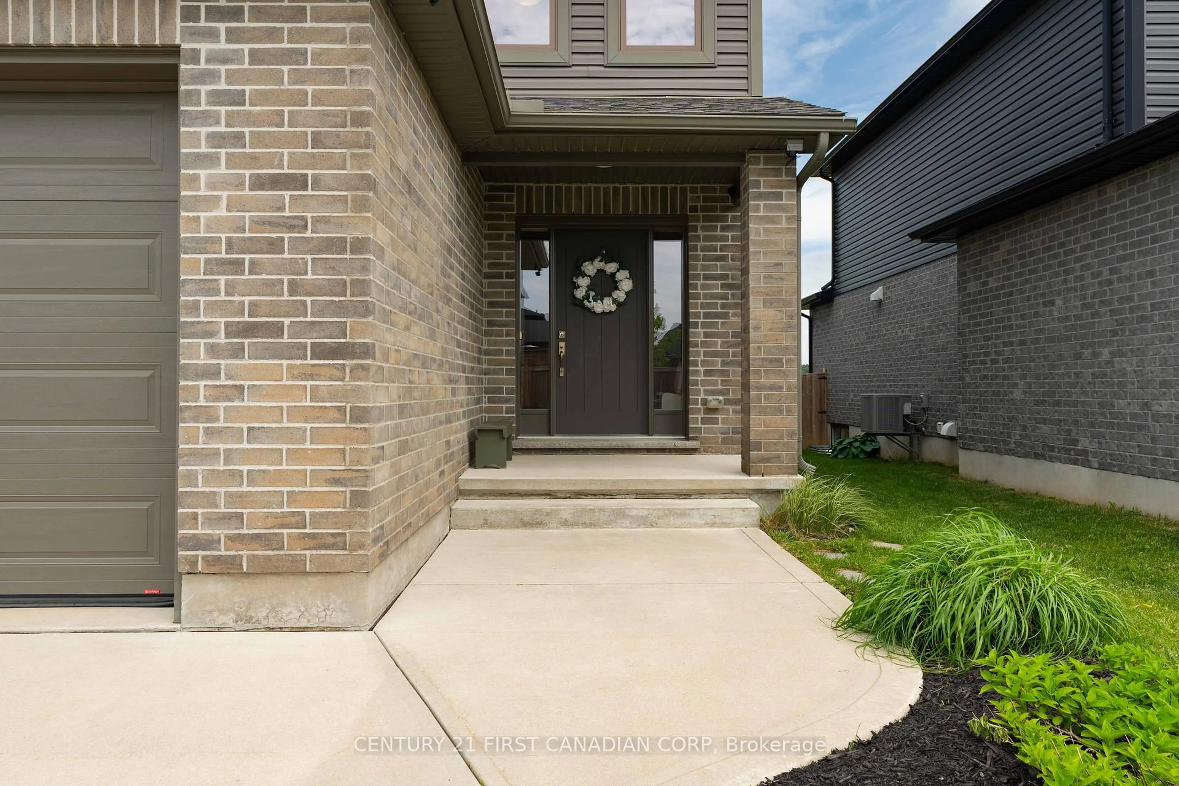 Home with brick exterior material, street for 148 Gilmour Dr, Lucan Biddulph Ontario N0M 2J0