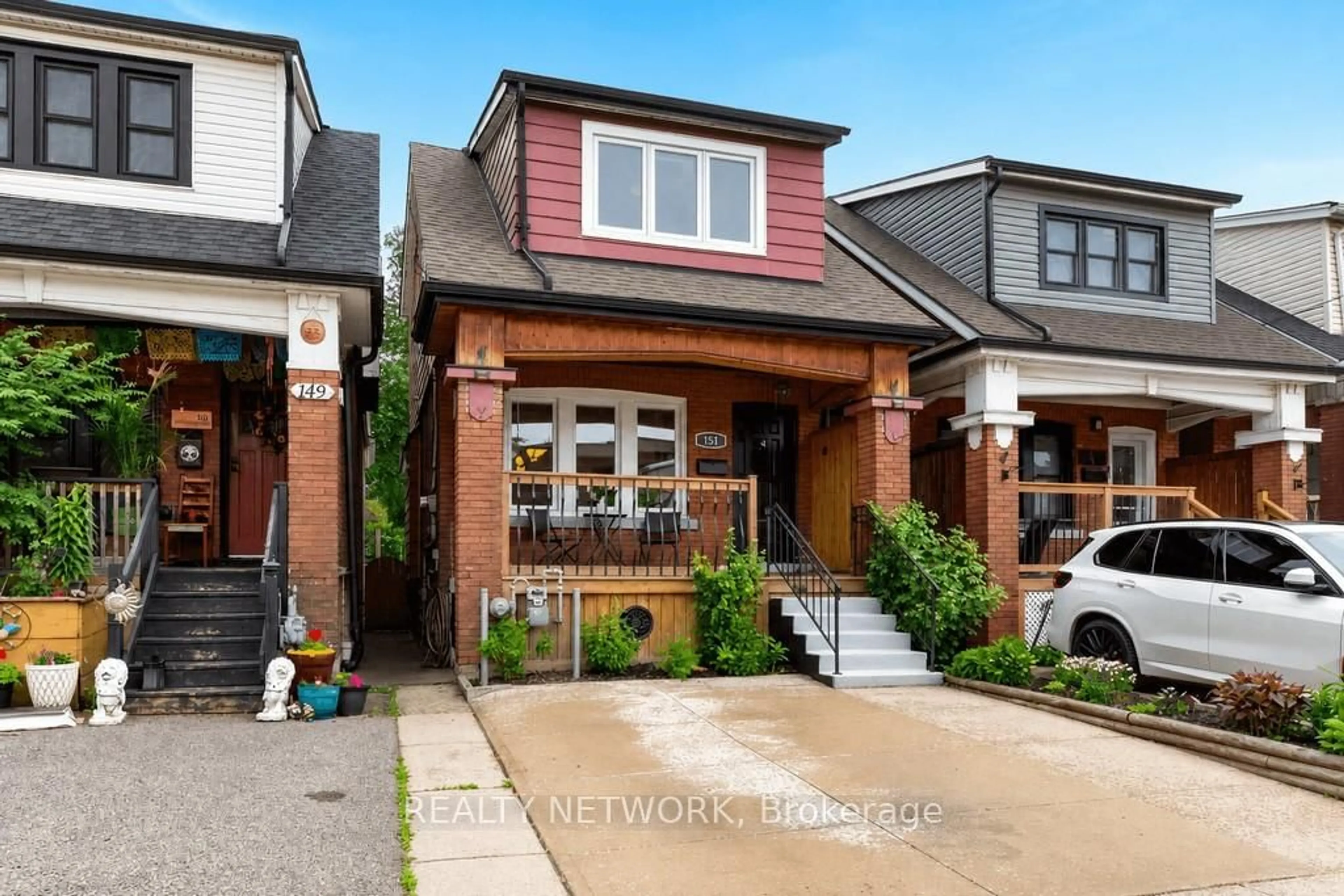 Home with brick exterior material, street for 151 Connaught Ave, Hamilton Ontario L8L 6Z4