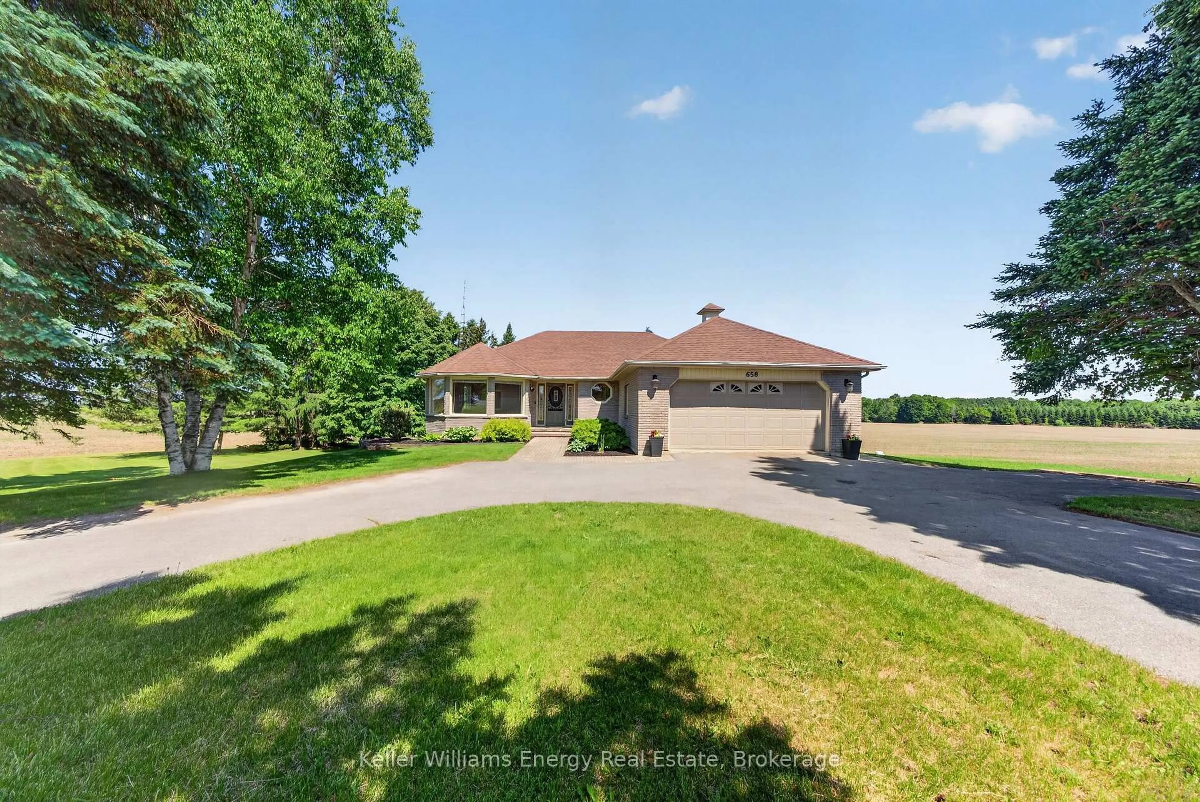 A pic from outside/outdoor area/front of a property/back of a property/a pic from drone, water/lake/river/ocean view for 658 Ridge Rd, Prince Edward County Ontario K0K 2T0