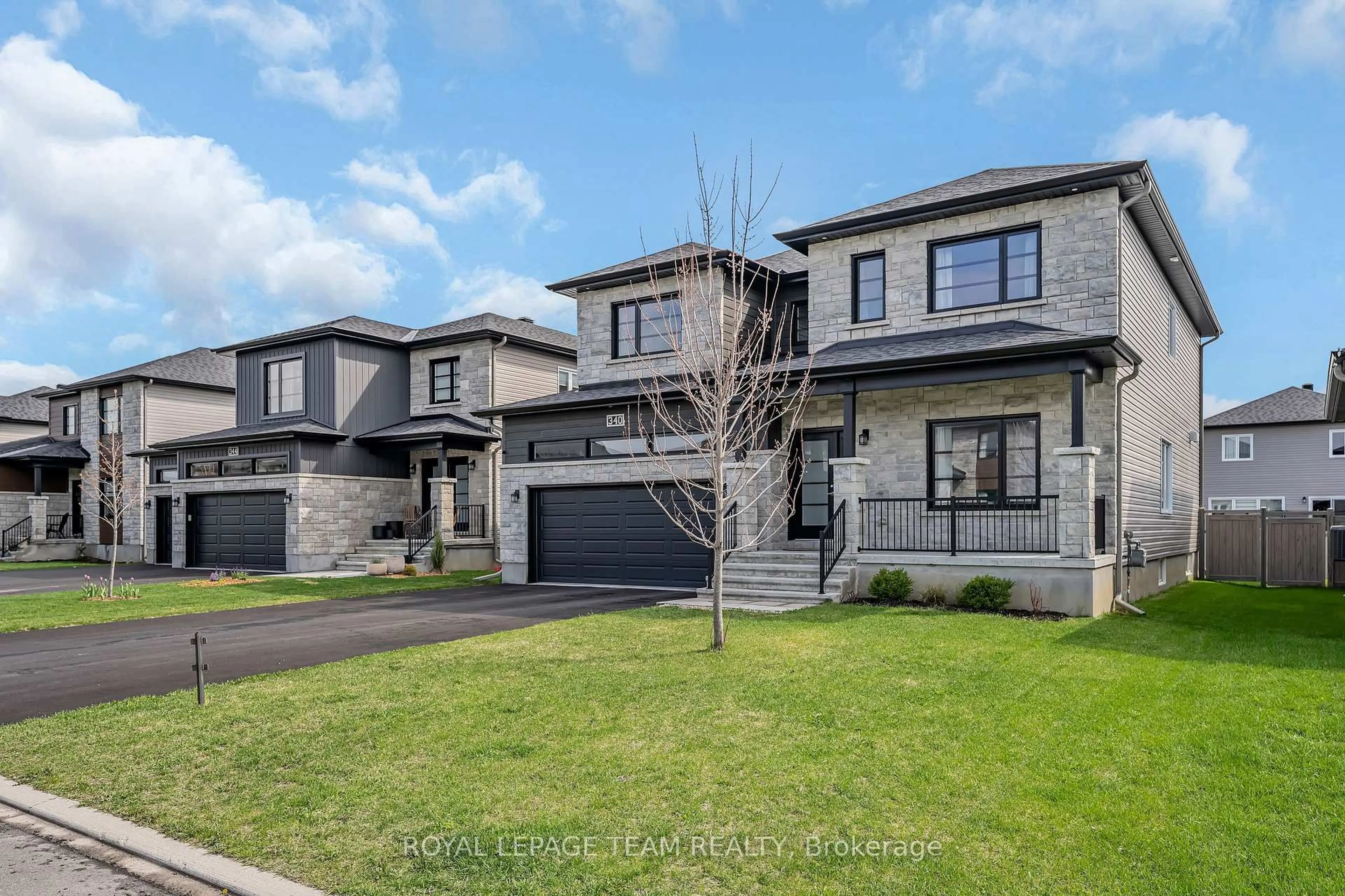 Home with brick exterior material, street for 340 Moonlight Dr, Russell Ontario K4R 0L1