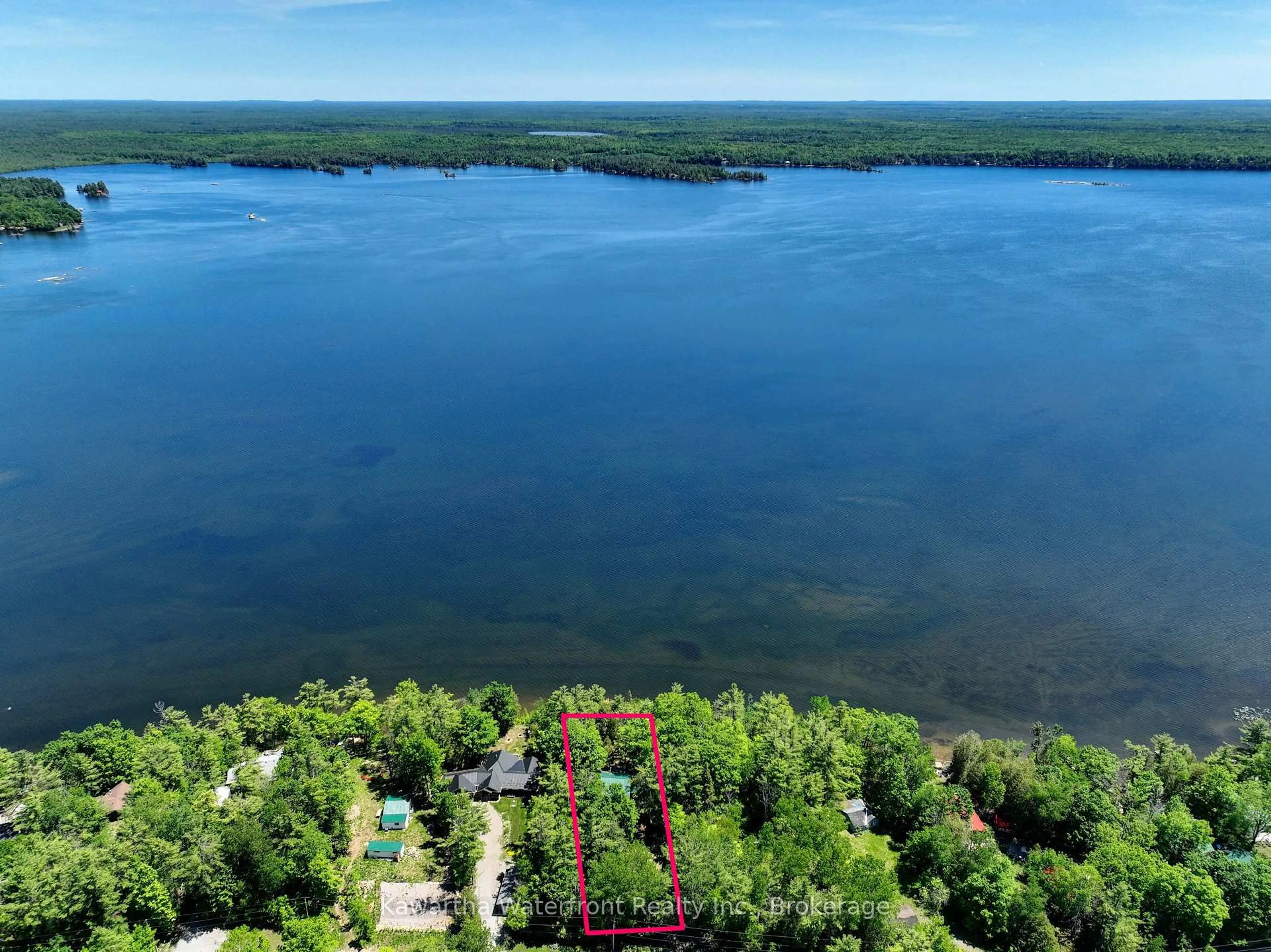 A pic from outside/outdoor area/front of a property/back of a property/a pic from drone, water/lake/river/ocean view for 14 Baker Blvd, Kawartha Lakes Ontario K0M 2B0