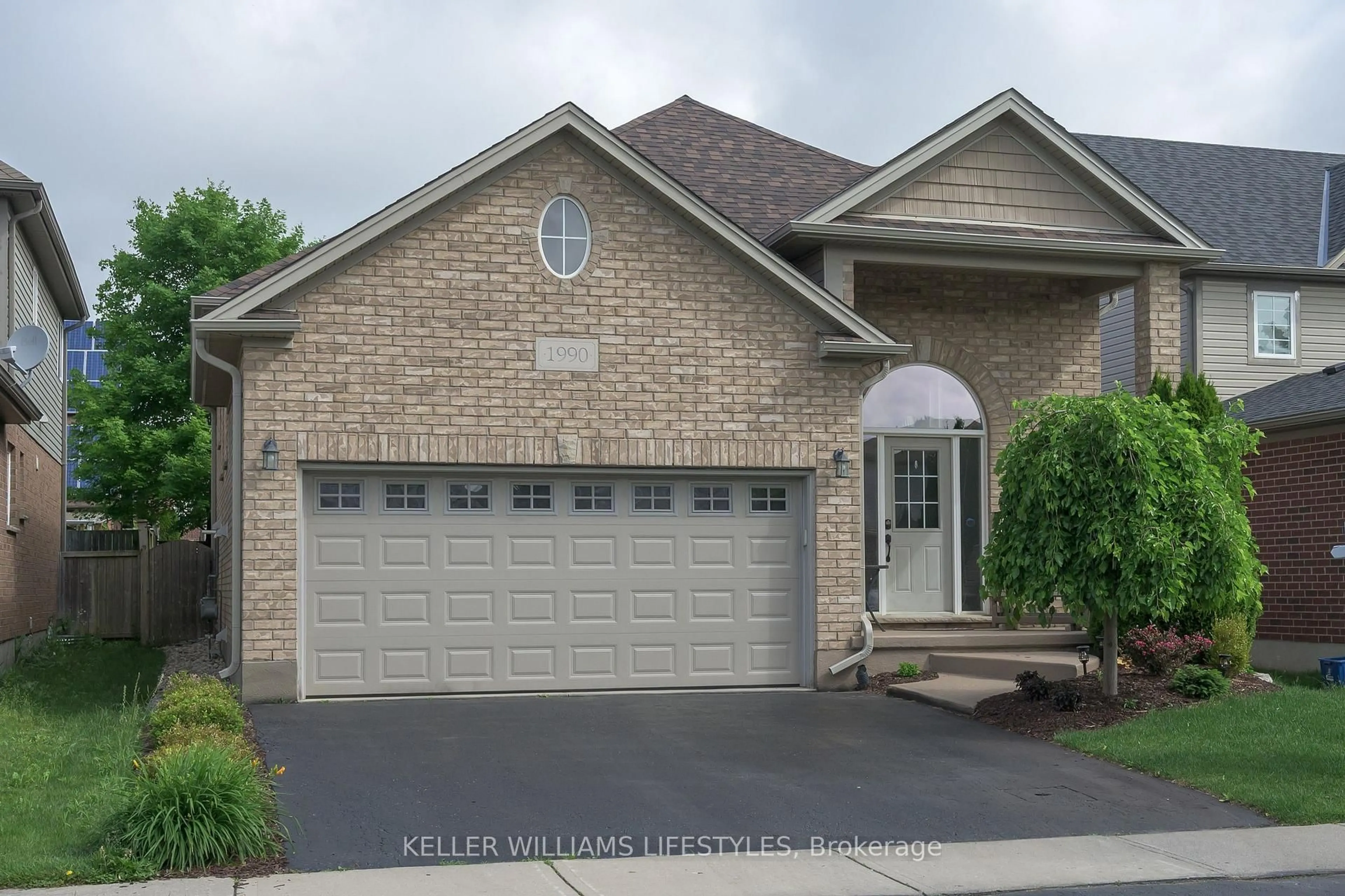 Home with brick exterior material, street for 1990 Foxwood Ave, London North Ontario N6G 0C5