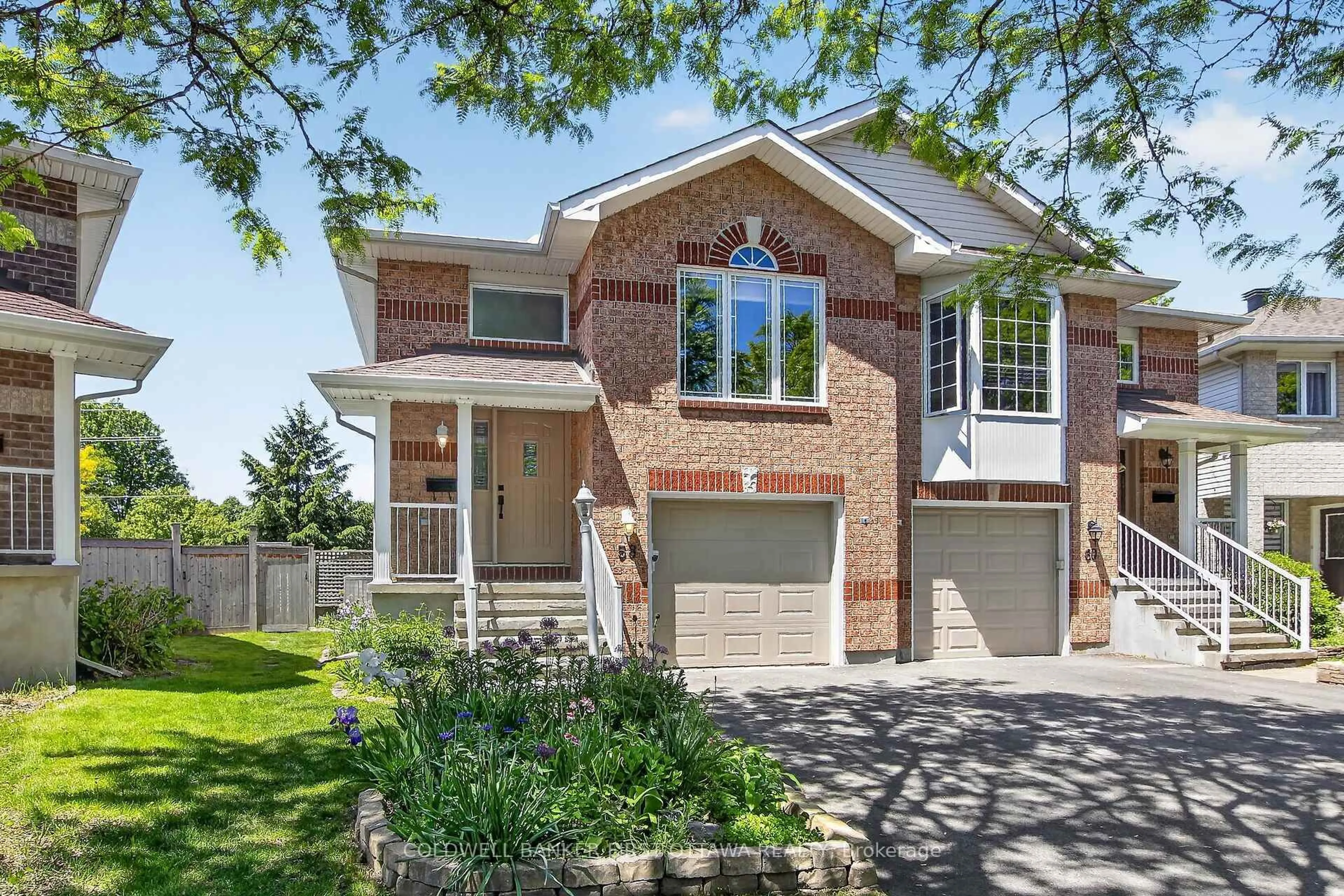 Home with brick exterior material, street for 58 Boulder Way, Ottawa Ontario K2J 4R6