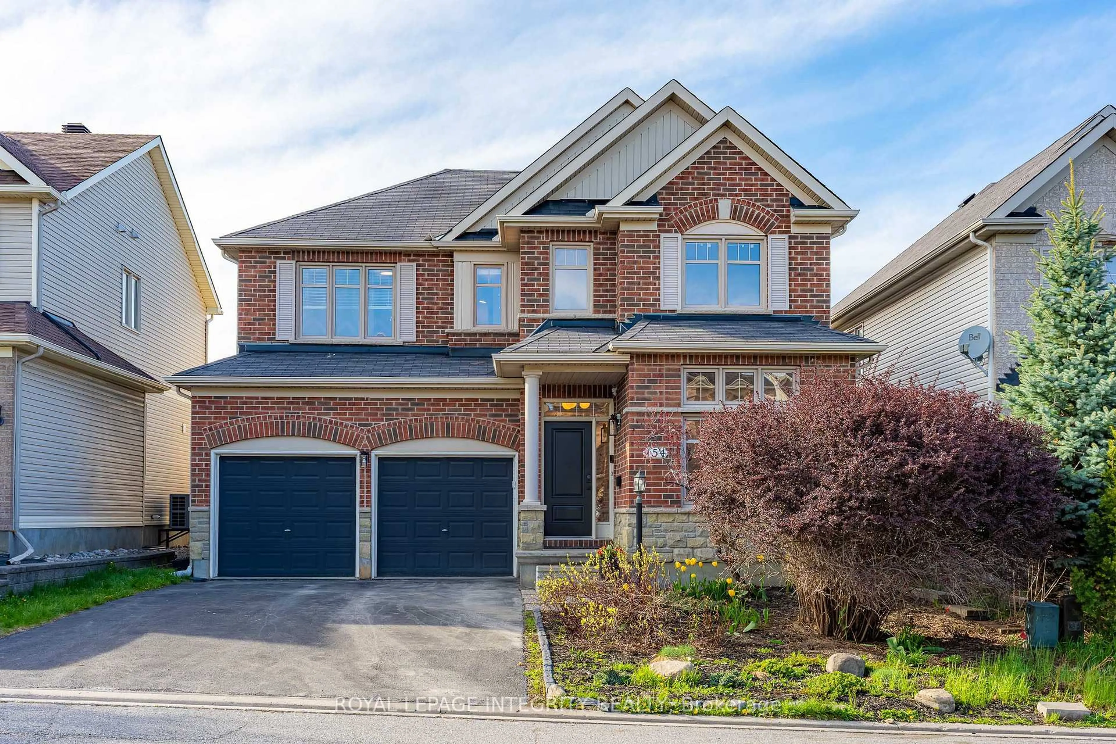 Home with brick exterior material, street for 154 Rodeo Dr, Ottawa Ontario K2J 5K7