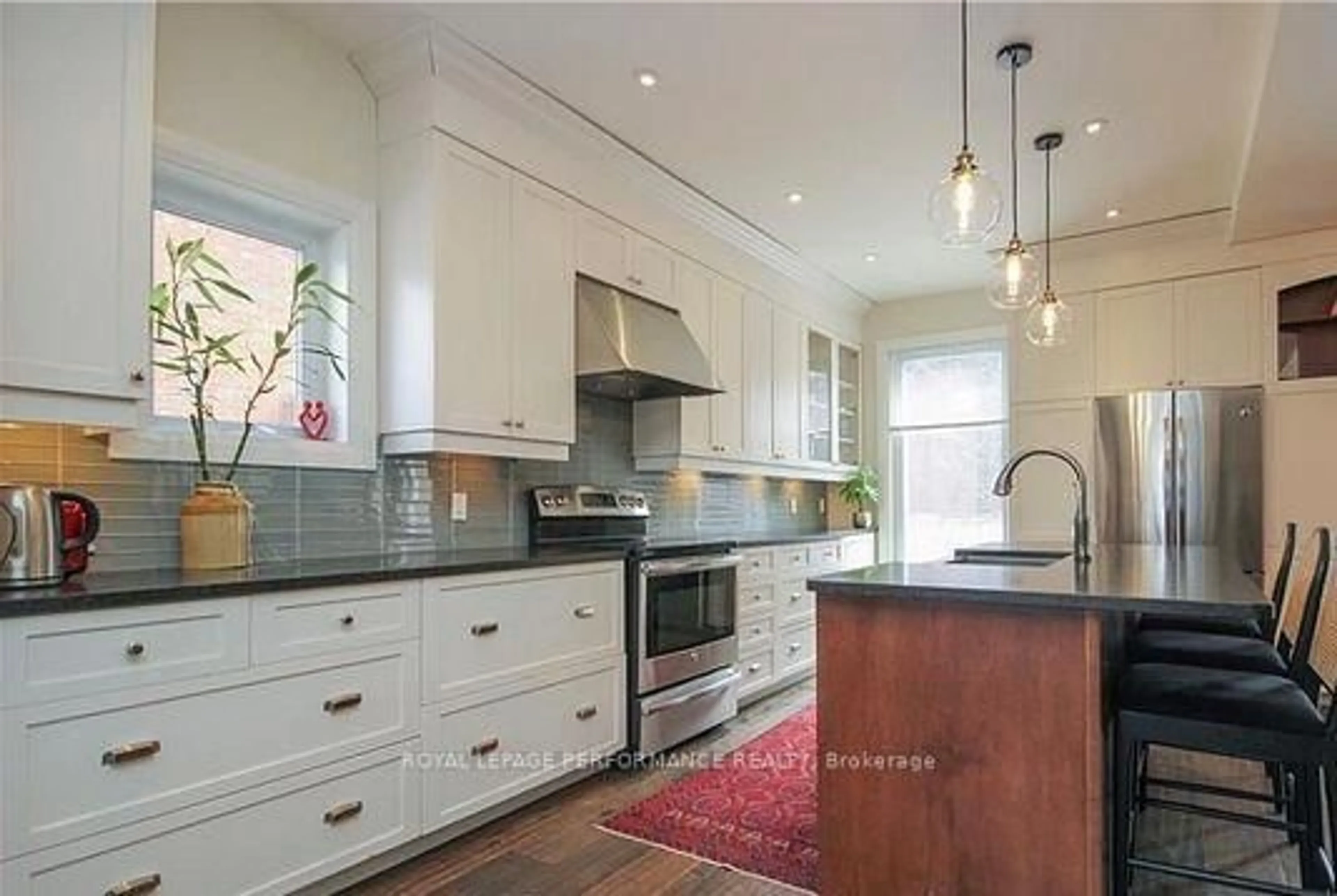 Open concept kitchen, ceramic/tile floor for 168 Stewart St, Ottawa Ontario K1N 6J9