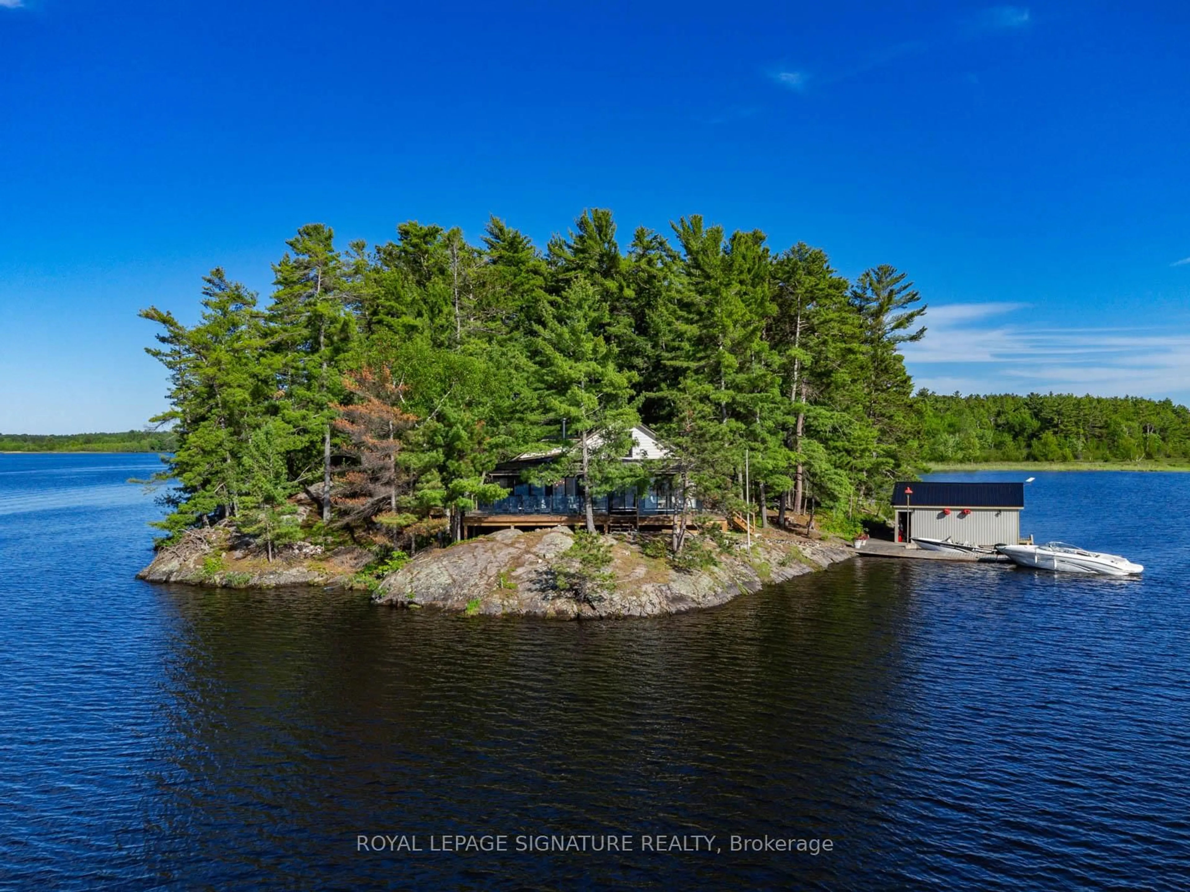 A pic from outside/outdoor area/front of a property/back of a property/a pic from drone, water/lake/river/ocean view for 2 Dad's Rest Island, Nipissing Ontario P0H 1W0