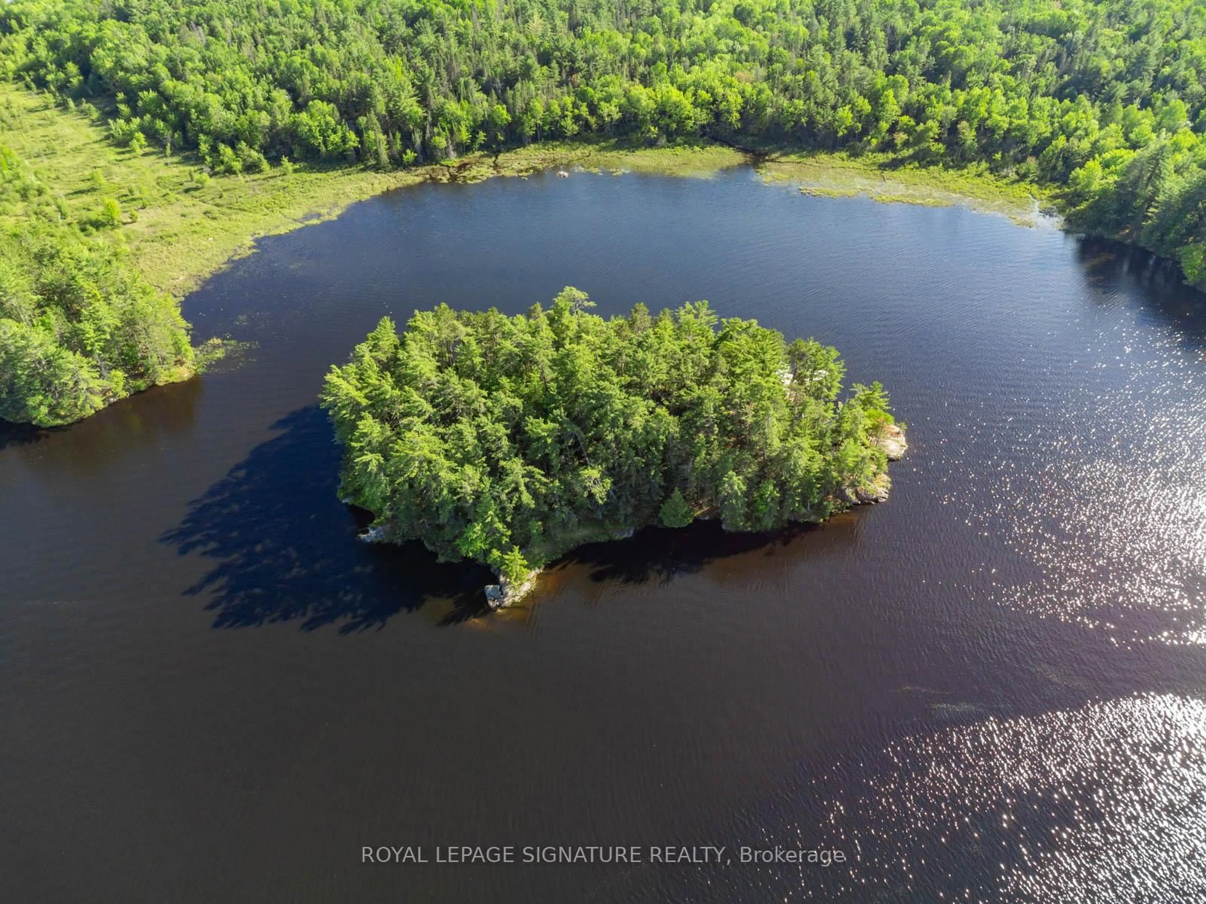A pic from outside/outdoor area/front of a property/back of a property/a pic from drone, water/lake/river/ocean view for 2 Dad's Rest Island, Nipissing Ontario P0H 1W0